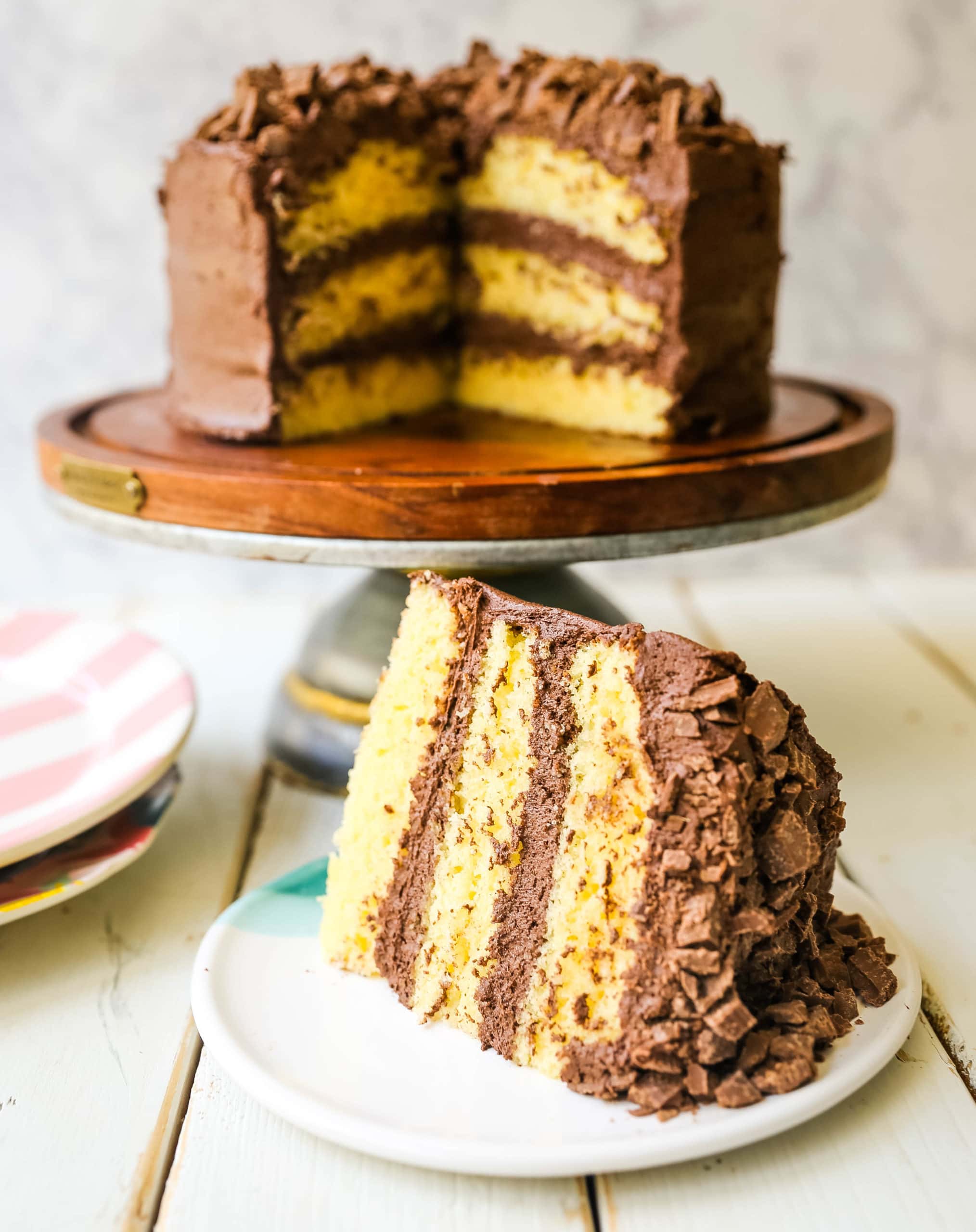 Yellow Cake with Chocolate Frosting The BEST Yellow Cake Recipe with Milk Chocolate Frosting. 5-Star Rated Recipe! www.modernhoney.com #yellowcake #homemadecake #cake #yellowcakechocolatefrosting #baking