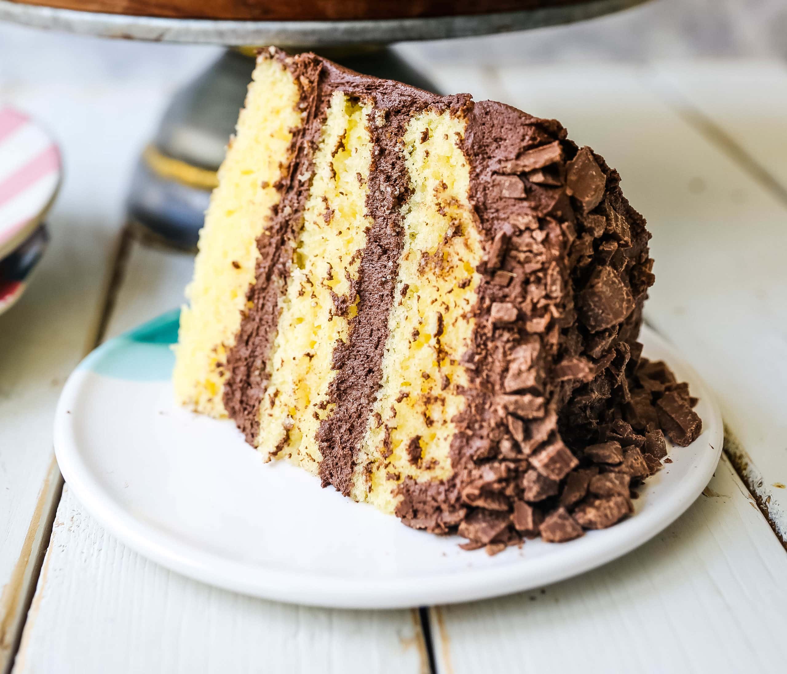 Yellow Cake with Chocolate Frosting The BEST Yellow Cake Recipe with Milk Chocolate Frosting. 5-Star Rated Recipe! www.modernhoney.com #yellowcake #homemadecake #cake #yellowcakechocolatefrosting #baking