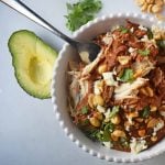 Crockpot Mexican Chicken Mole. Rich mole made easy in a slow cooker. Tender chicken covered in a rich, spiced, flavorful mole sauce. Can be made into chicken mole tacos by placing inside corn tortillas and topping with queso fresco, cilantro, white onion, and avocado. An easy crockpot dinner!