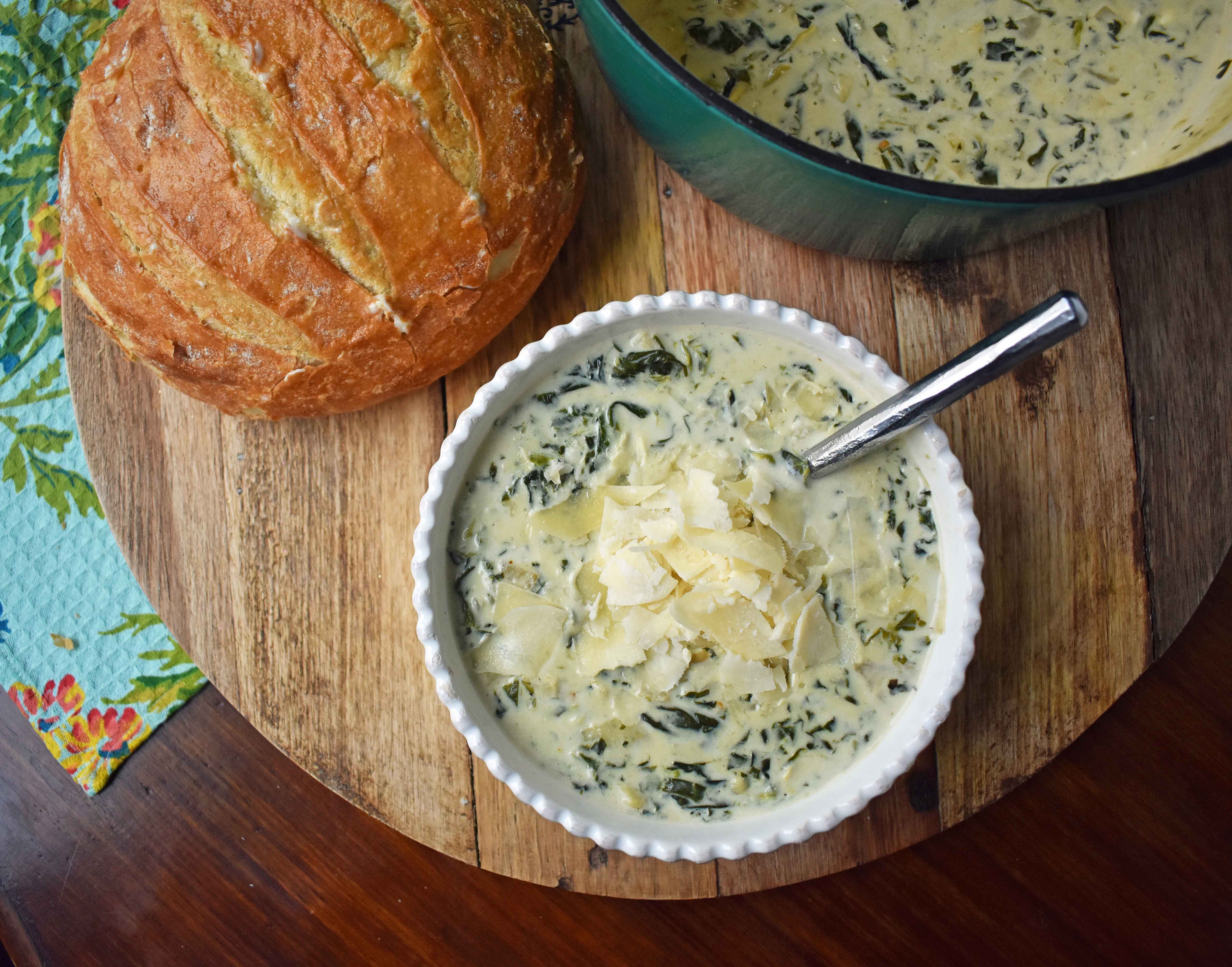 Creamy Spinach Artichoke Soup by Modern Honey. Rich and creamy parmesan cheese cream soup with spinach and artichokes. Perfect soup for a cold winter's day. www.modernhoney.com