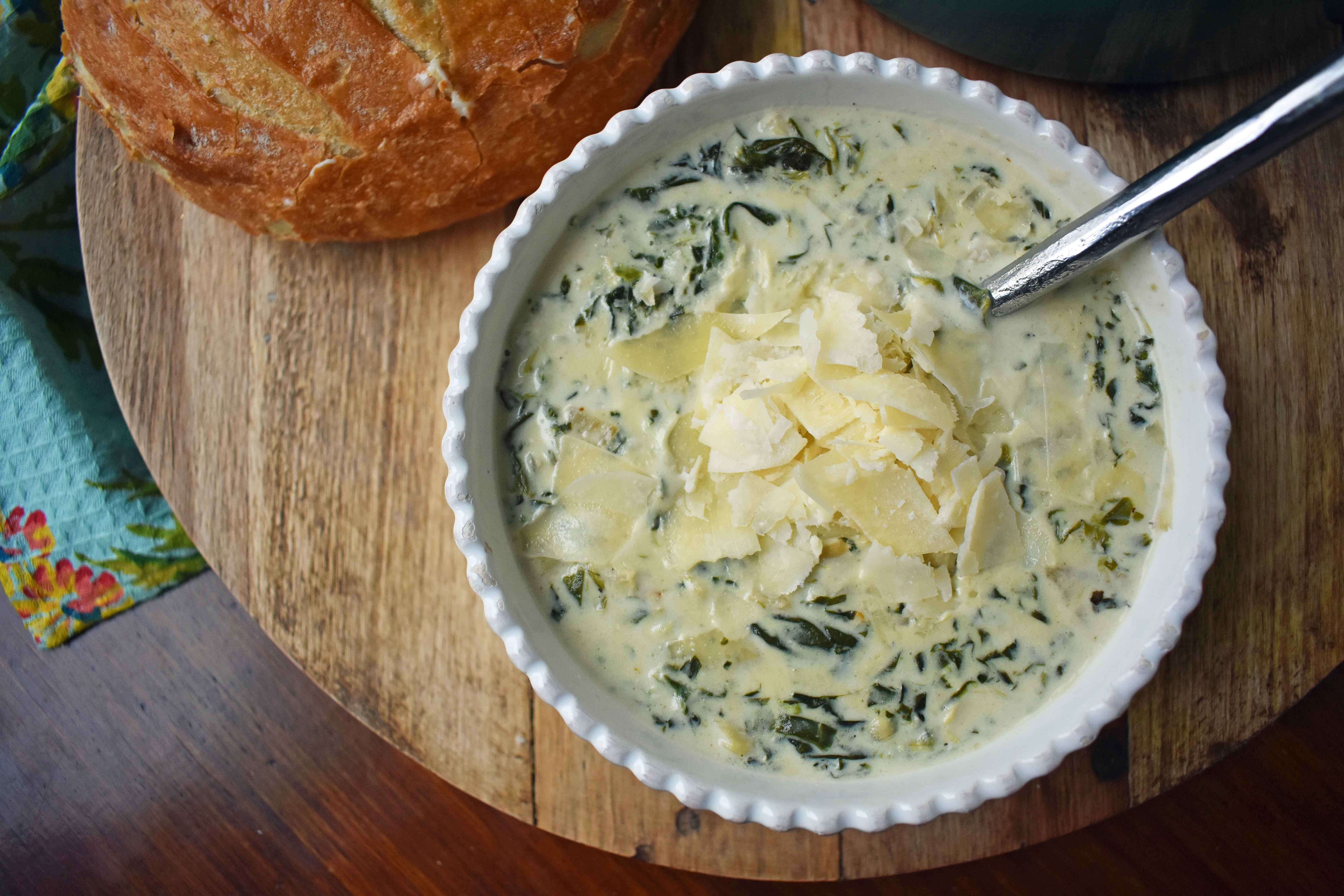 Creamy Spinach Artichoke Soup by Modern Honey. Rich and creamy parmesan cheese cream soup with spinach and artichokes. Perfect soup for a cold winter's day. www.modernhoney.com