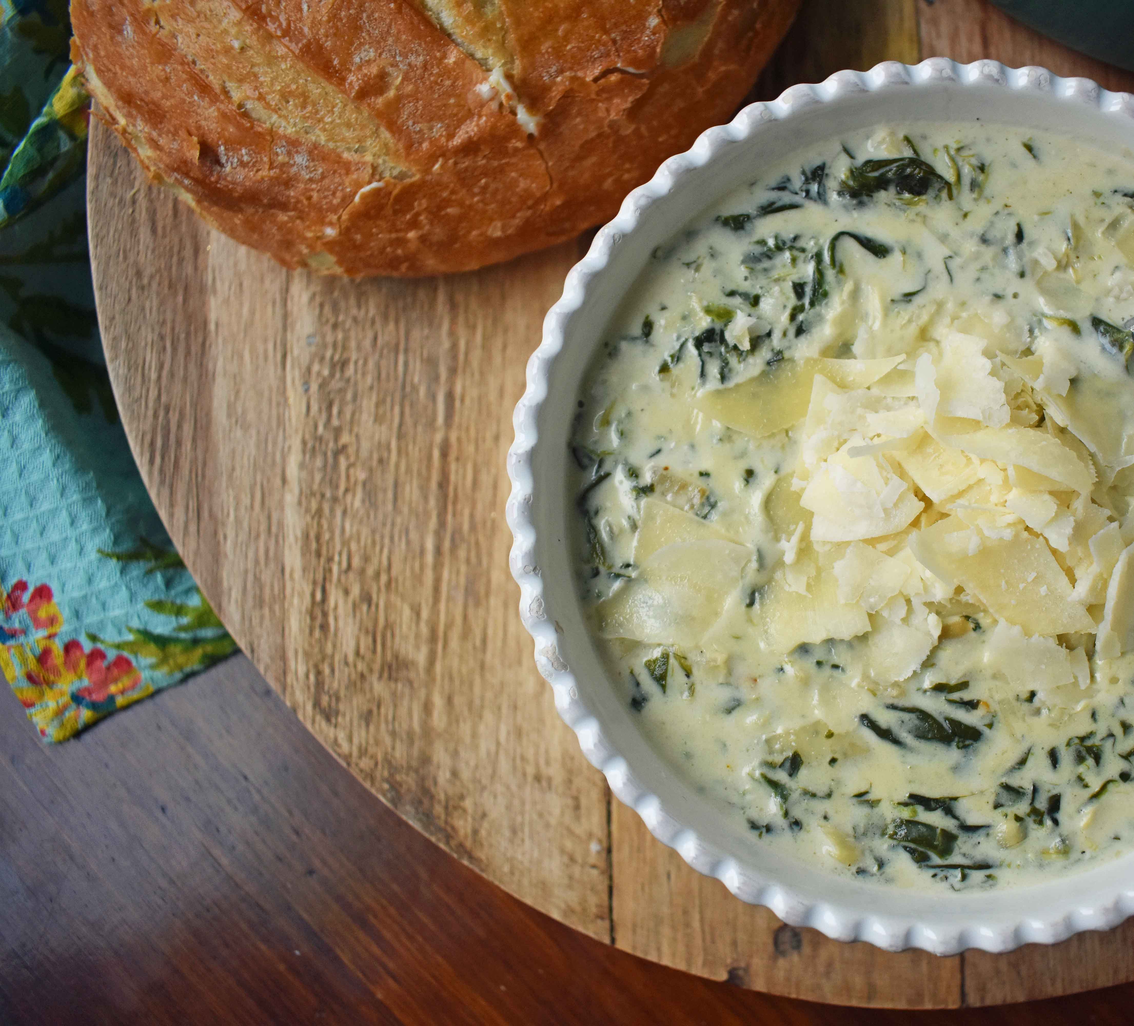 Creamy Spinach Artichoke Soup by Modern Honey. Rich and creamy parmesan cheese cream soup with spinach and artichokes. Perfect soup for a cold winter's day. www.modernhoney.com