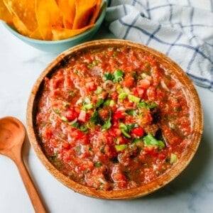 This is the best homemade salsa recipe! Fresh salsa made with the freshest of ingredients -- tomatoes, cilantro, jalapeno, green onions, and a secret ingredient makes this homemade salsa taste like it's from an authentic Mexican restaurant!