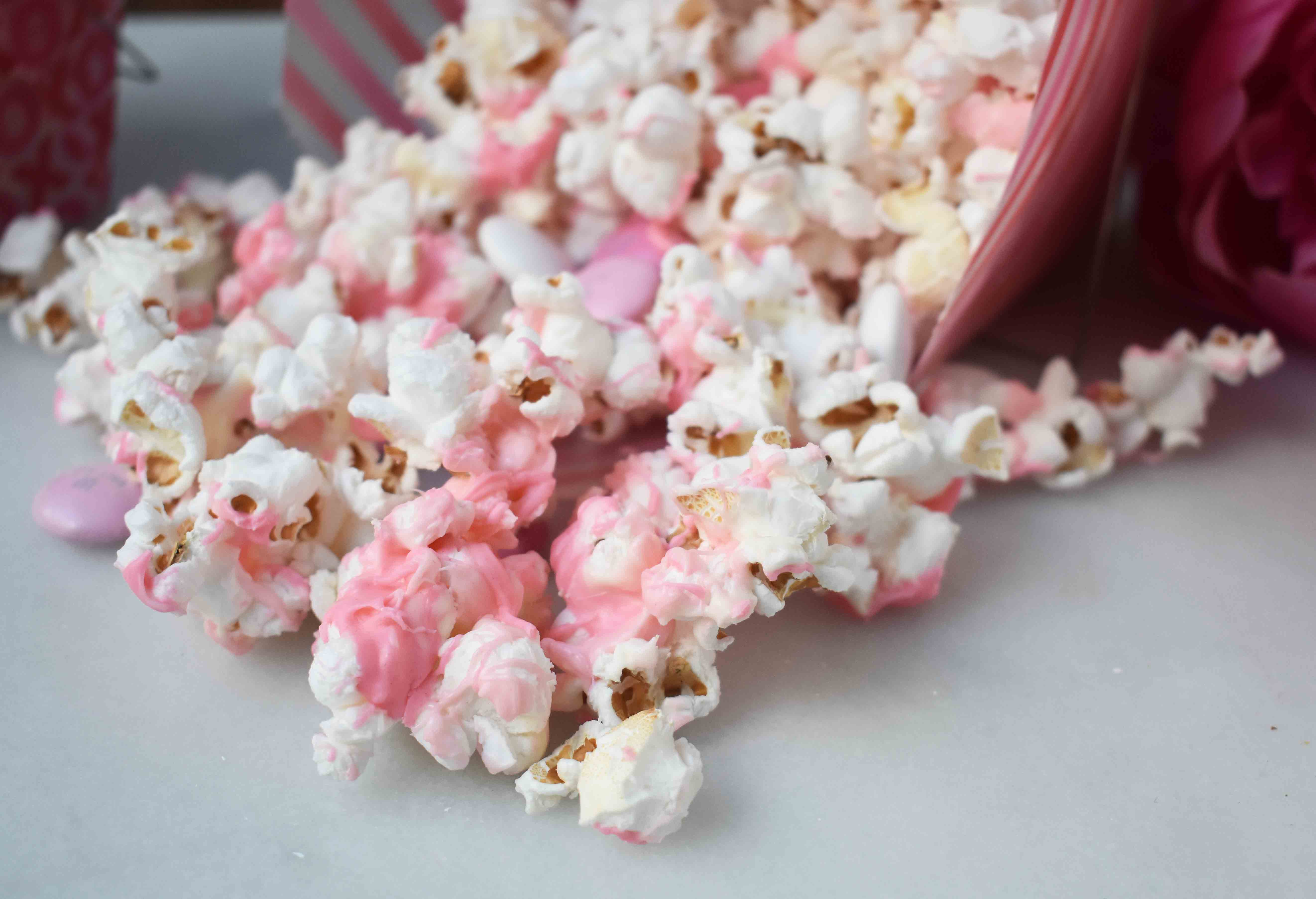 Homemade Valentine's Day White Chocolate and M & M Popcorn. www.modernhoney.com