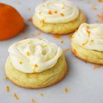 RubySnap Judy Orange Cream Cookies. Soft citrus orange dough cookie topped with sweet orange cream cheese frosting. An orange cream lovers dream cookie! www.modernhoney.com