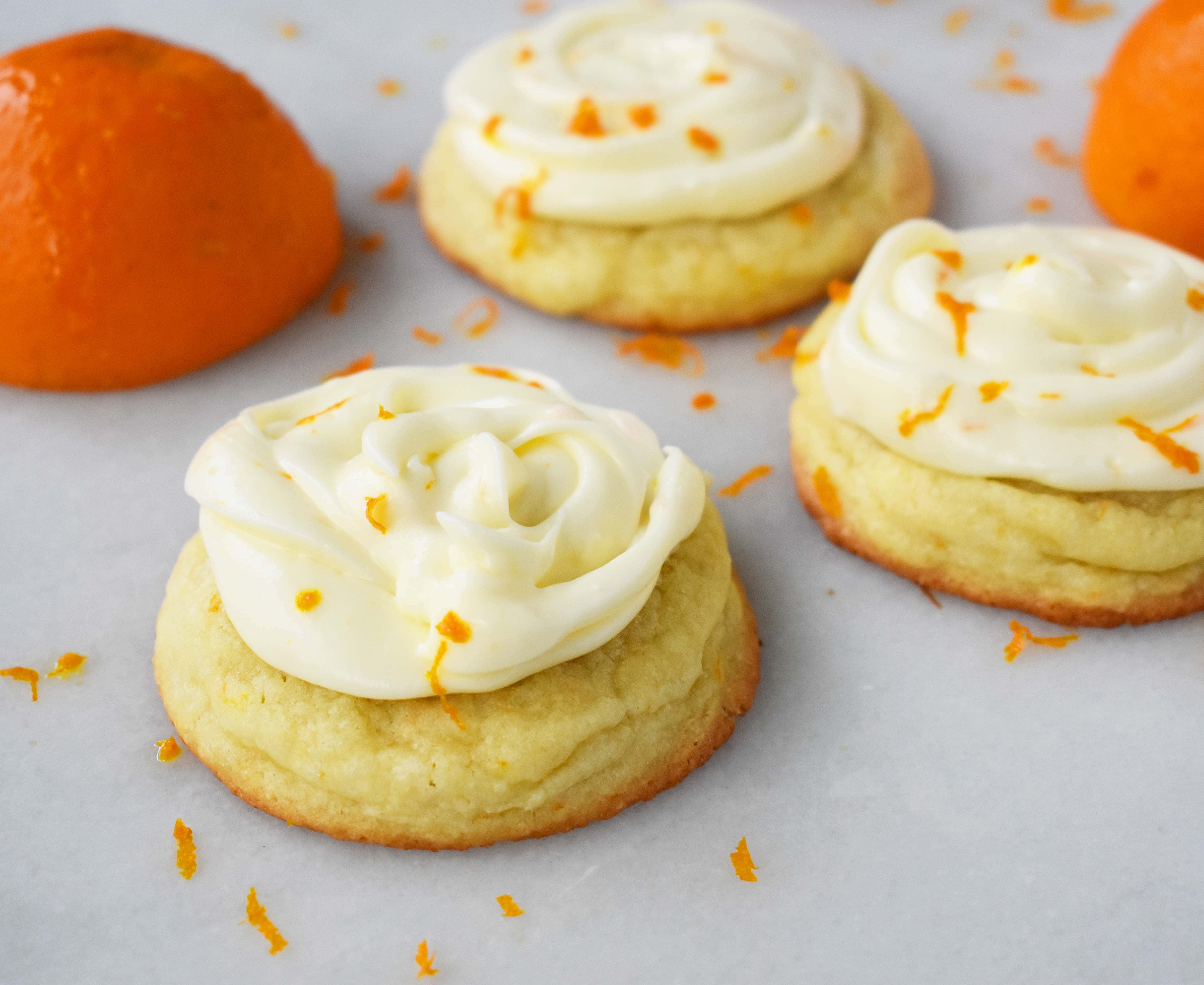 RubySnap Judy Orange Cream Cookies. Soft citrus orange dough cookie topped with sweet orange cream cheese frosting. An orange cream lovers dream cookie! www.modernhoney.com