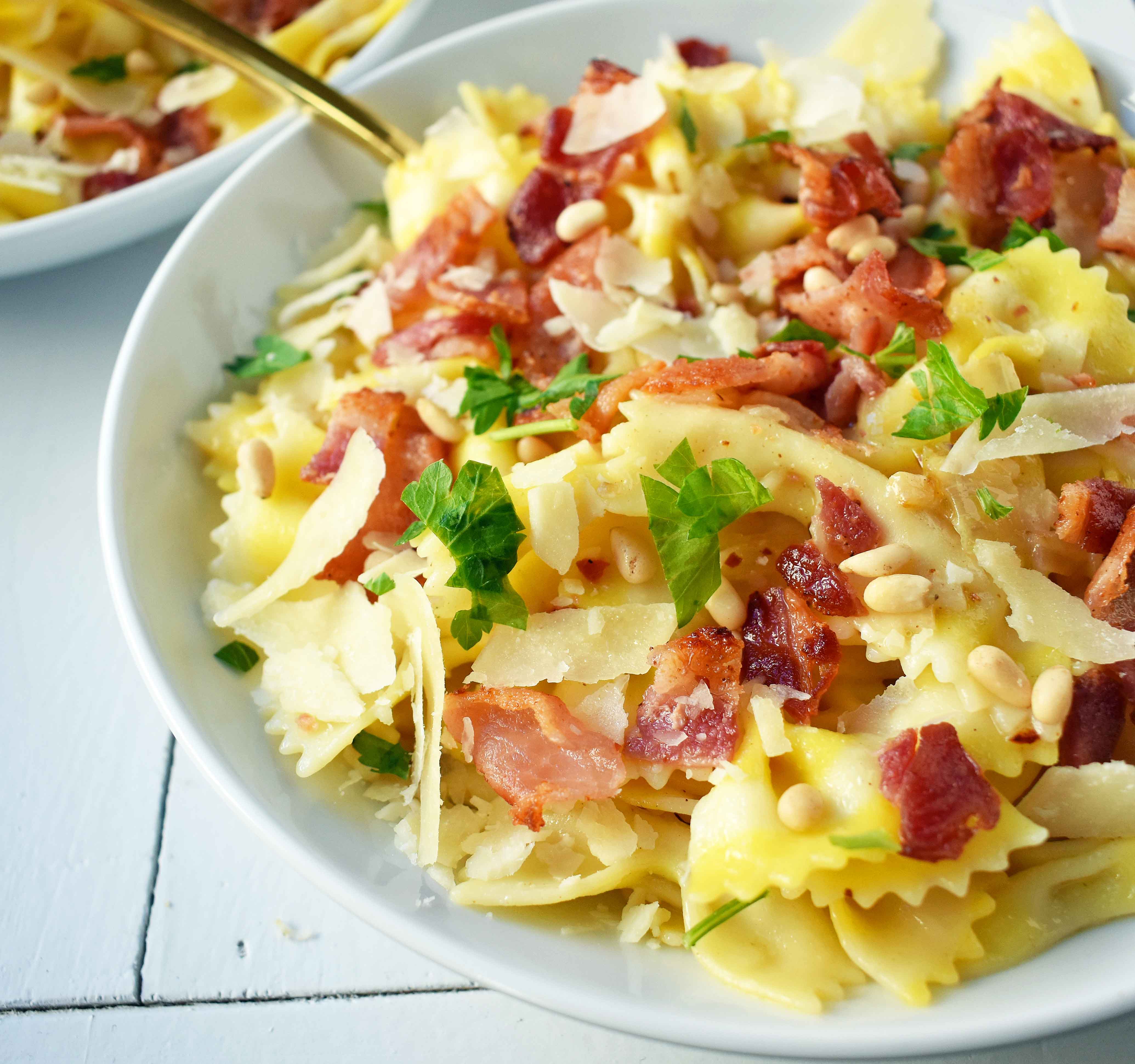 Lemon Garlic and Crispy Bacon Pasta. Farfalle, bowtie pasta, with butter, caramelized onions, and garlic all topped with crispy bacon, parmesan cheese, and pine nuts. A light and fresh pasta with lemon butter and bacon. www.modernhoney.com
