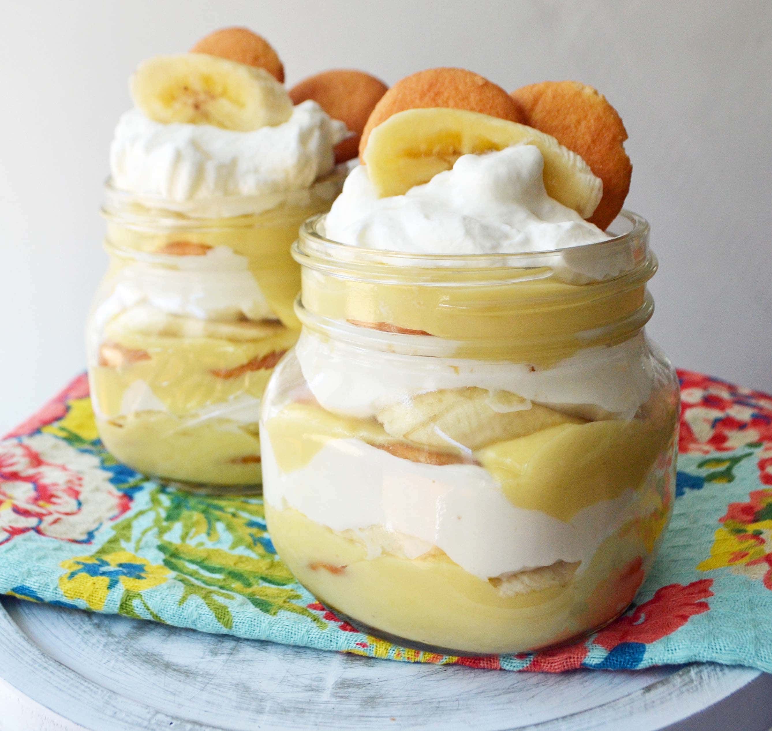 Homemade Banana Pudding Dessert Recipe. Slow cooked vanilla bean custard layered with fresh bananas, nilla wafers and fluffy whipped cream. A perfect Southern dessert and homemade Magnolia Bakery copycat with made from scratch pudding. www.modernhoney.com