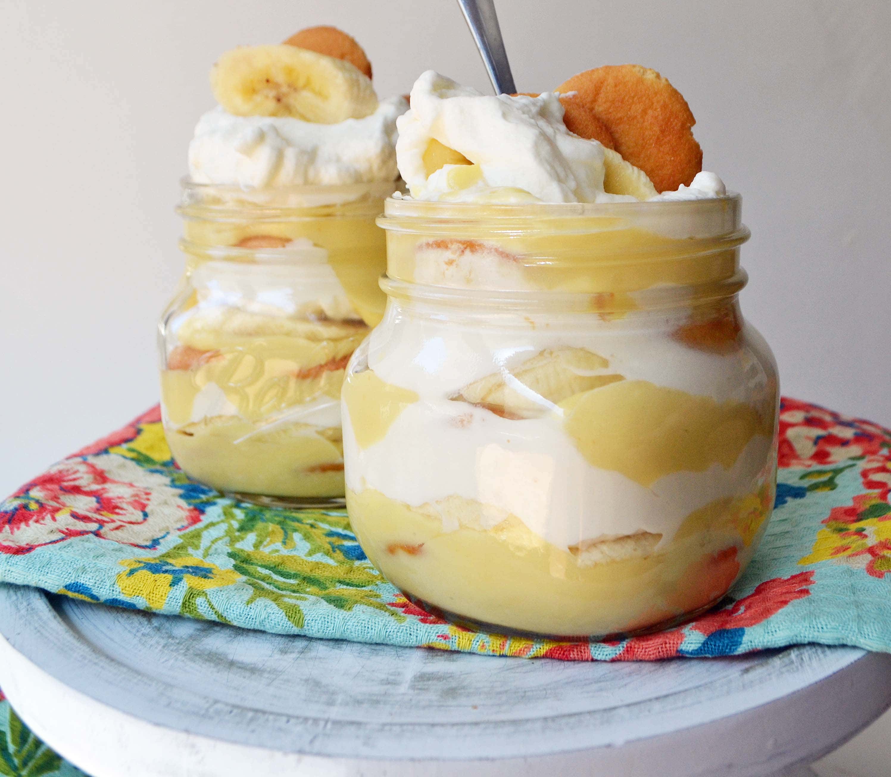 Homemade Banana Pudding Dessert Recipe. Slow cooked vanilla bean custard layered with fresh bananas, nilla wafers and fluffy whipped cream. A perfect Southern dessert and homemade Magnolia Bakery copycat with made from scratch pudding. www.modernhoney.com