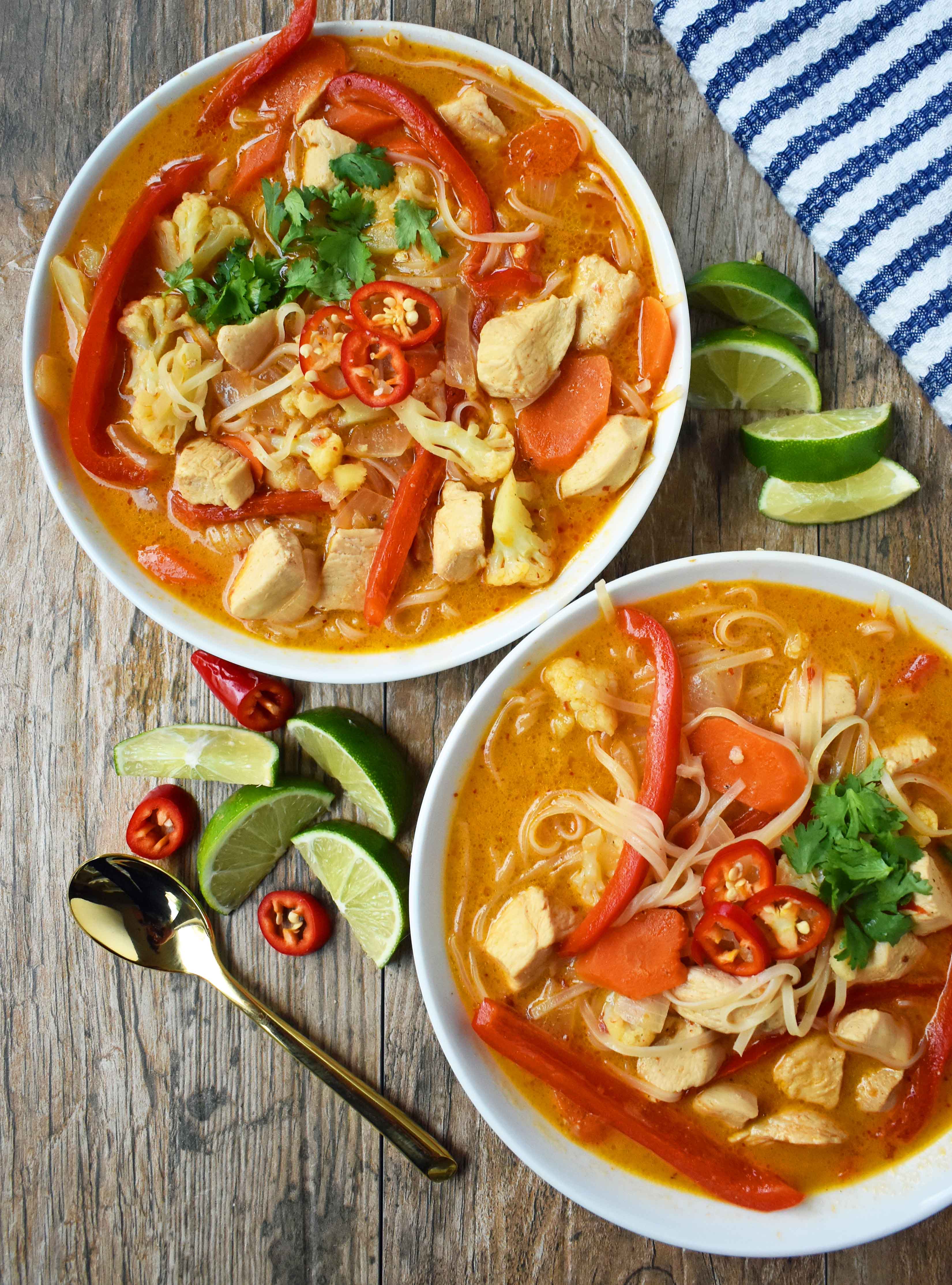 Thai Chicken Noodle Soup. Gluten-free and Dairy-Free nutritious soup that is full of flavor. A rich coconut milk red curry based broth filled with onions, carrots, ginger, cauliflower, and red pepper. A healthy and delicious soup that everyone loves! www.modernhoney.com