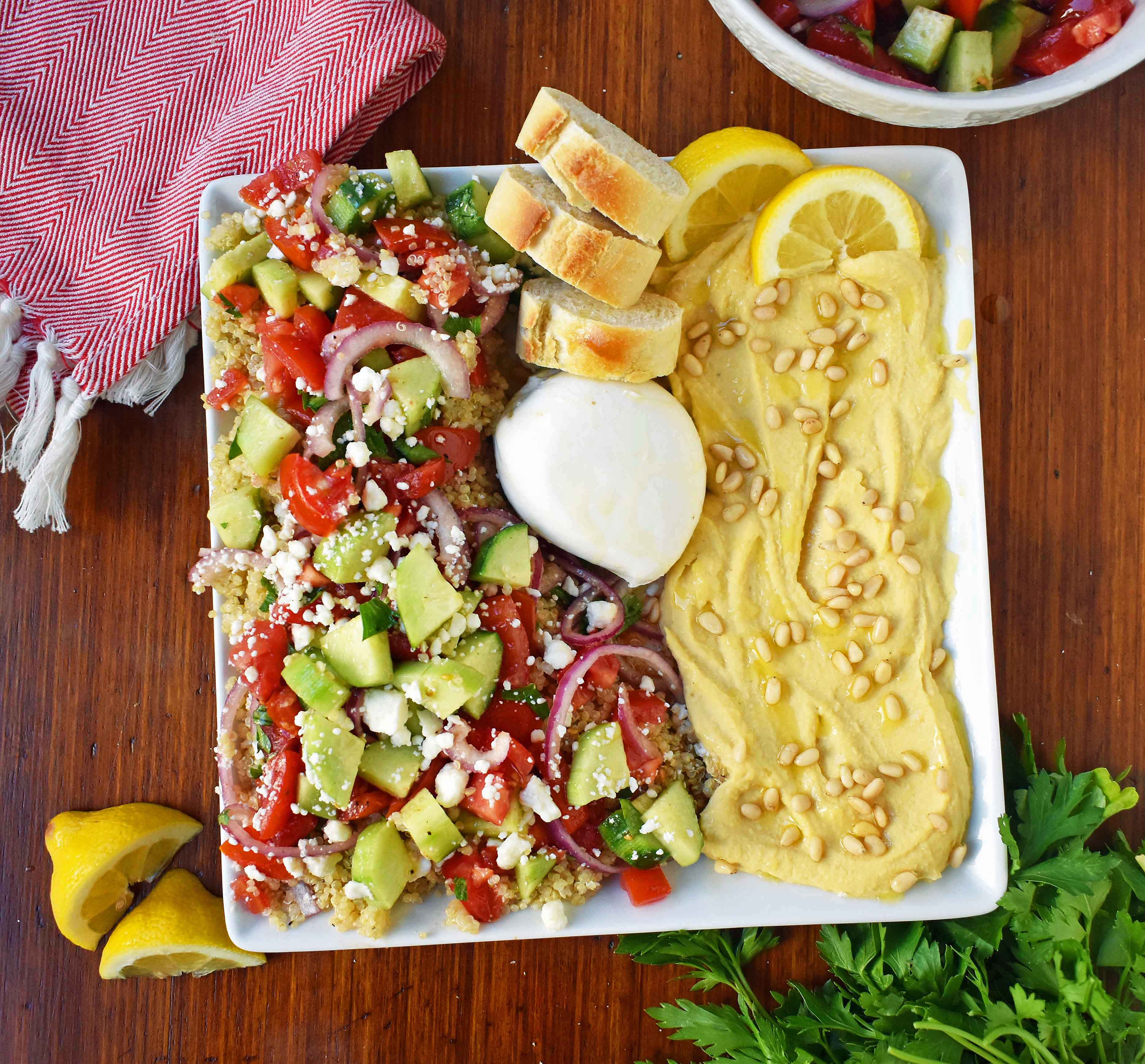 Mediterranean Quinoa Salad. Quinoa tossed with fresh tomatoes, cucumber, red onion, italian parsley, extra virgin olive oil, red wine vinegar, and feta cheese. A healthy, beautiful salad! www.modernhoney.com