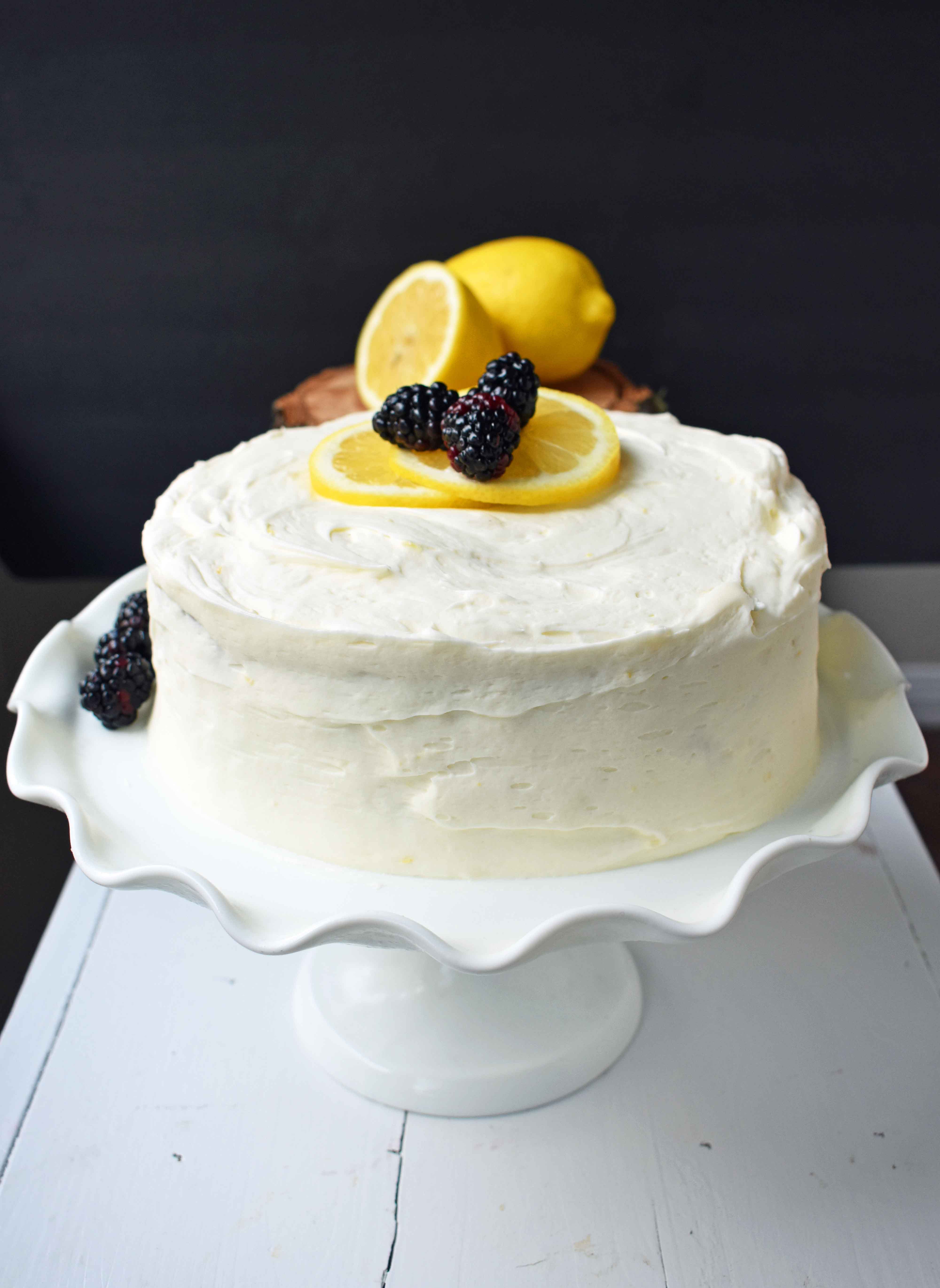 Italian Lemon Olive Oil Cake. Soft and tender moist lemon cake topped with lemon vanilla cream cheese frosting. The perfect lemon cake! www.modernhoney.com