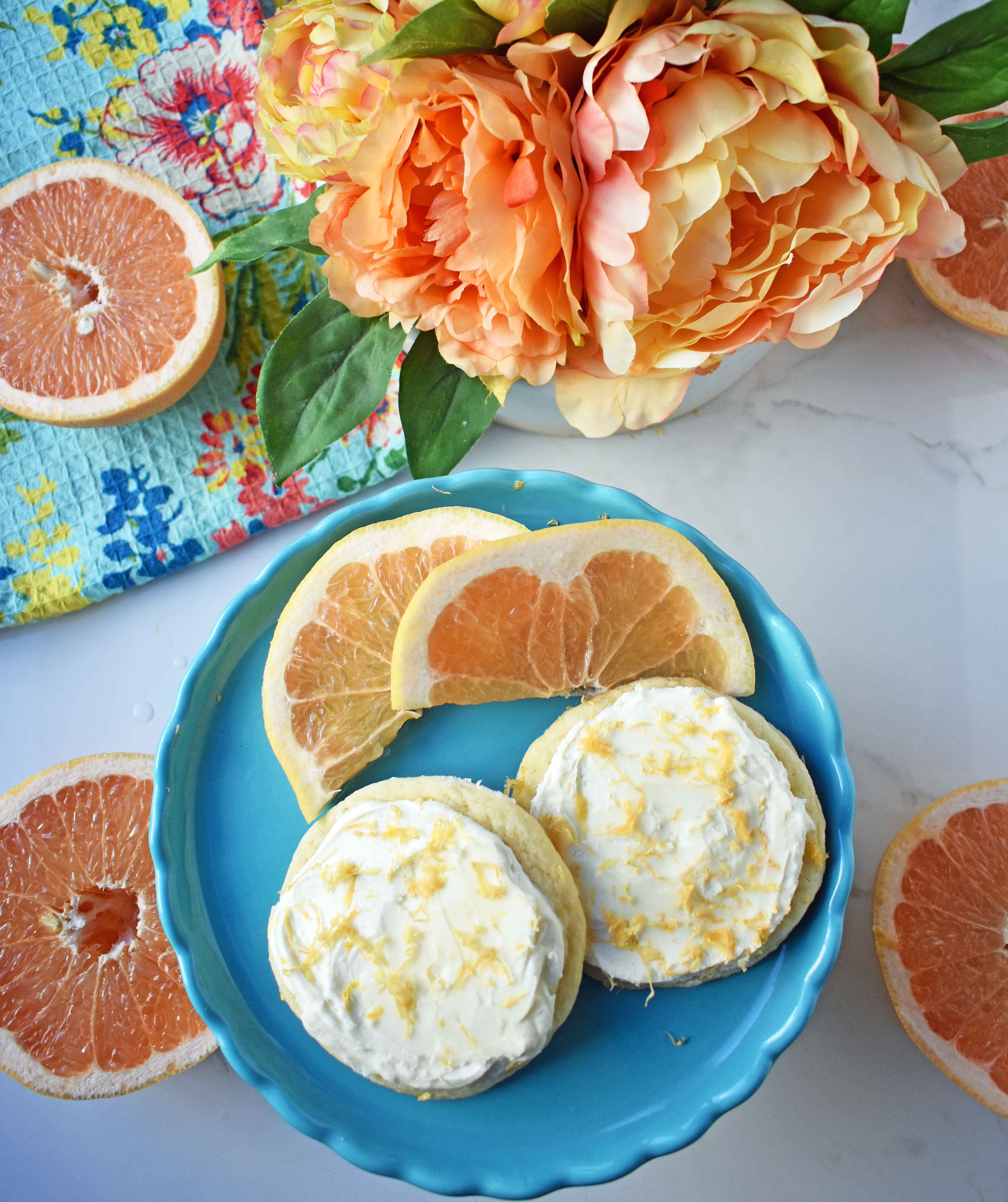 Grapefruit Sugar Cookies with White Chocolate Buttercream. Soft grapefruit citrus cookies topped with homemade white chocolate frosting. www.modernhoney.com