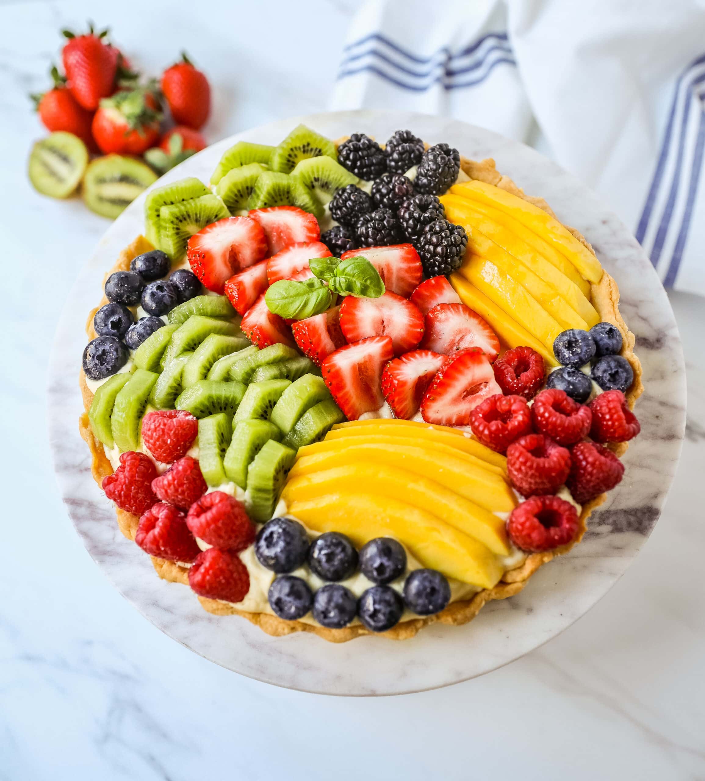 Fruit Tart with Pastry Cream This French fruit tart is made with a flaky, buttery pie crust, filled with homemade vanilla bean pastry cream, and topped with fresh fruit.