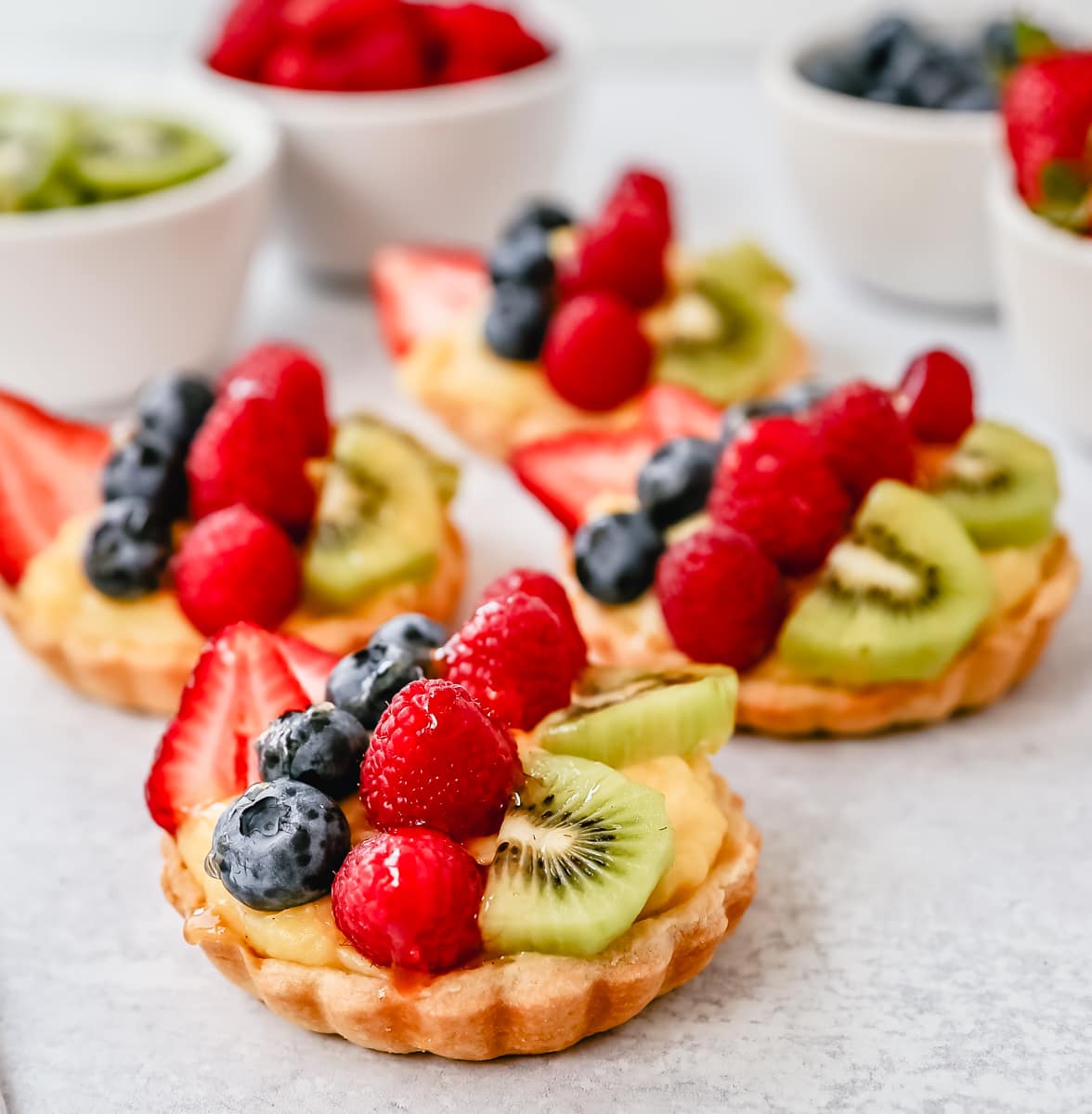 Fruit Tart with Pastry Cream This French fruit tart is made with a flaky, buttery pie crust, filled with homemade vanilla bean pastry cream, and topped with fresh fruit.