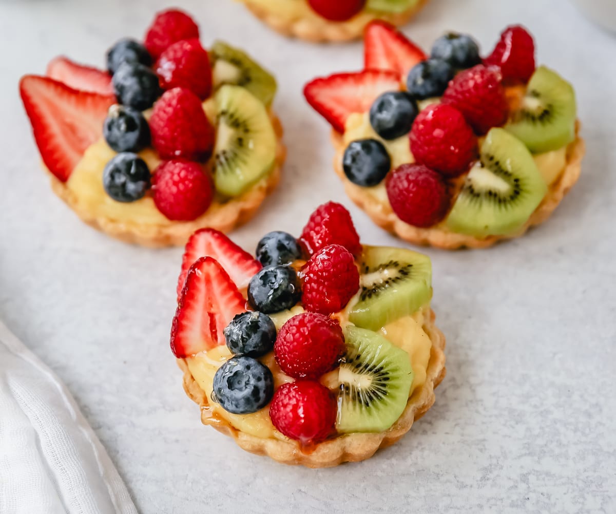 Fruit Tart with Pastry Cream This French fruit tart is made with a flaky, buttery pie crust, filled with homemade vanilla bean pastry cream, and topped with fresh fruit.