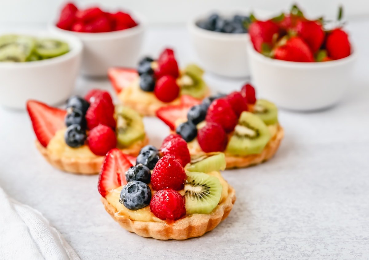 Fruit Tart with Pastry Cream This French fruit tart is made with a flaky, buttery pie crust, filled with homemade vanilla bean pastry cream, and topped with fresh fruit.