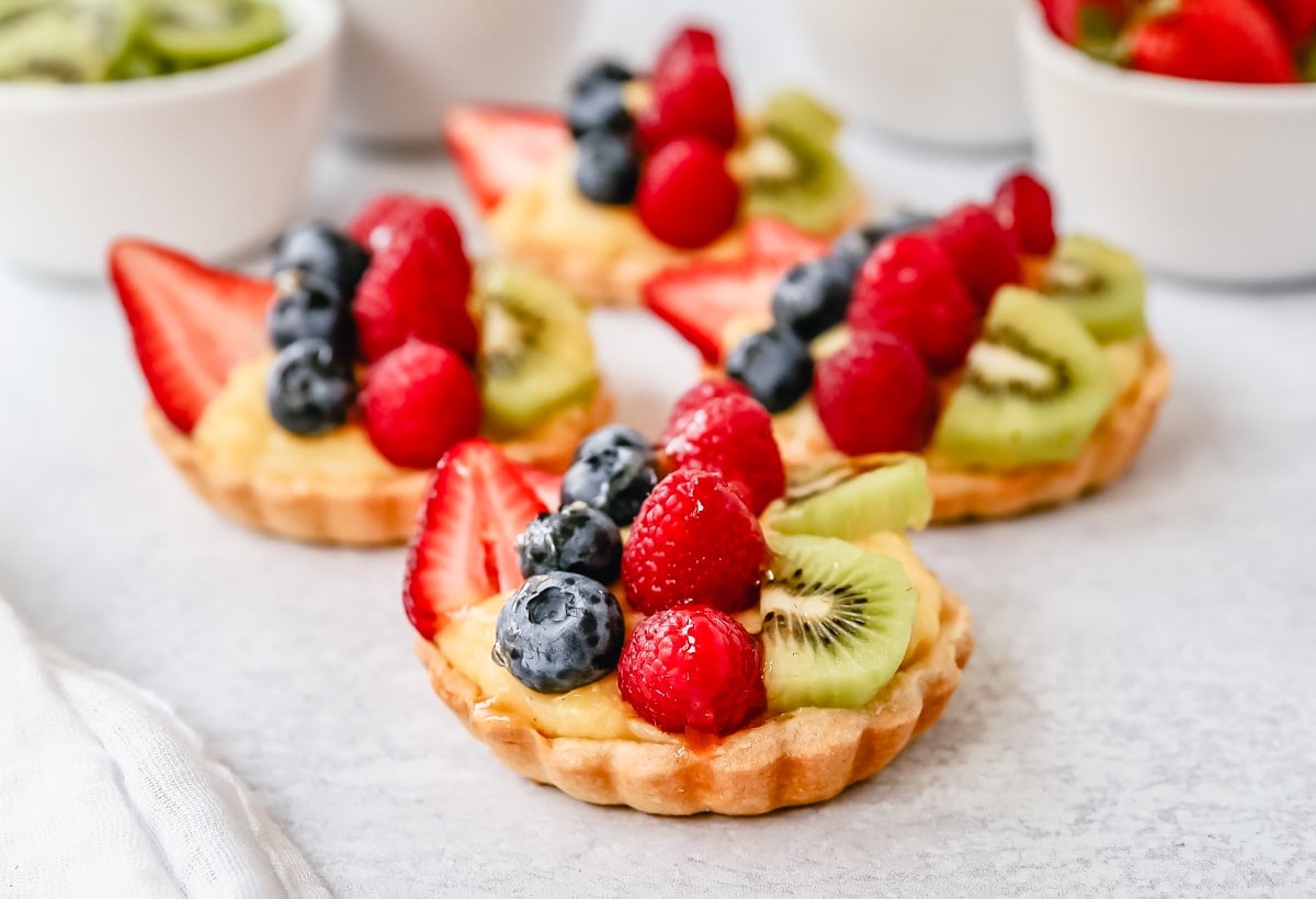 Fruit Tart with Pastry Cream This French fruit tart is made with a flaky, buttery pie crust, filled with homemade vanilla bean pastry cream, and topped with fresh fruit.