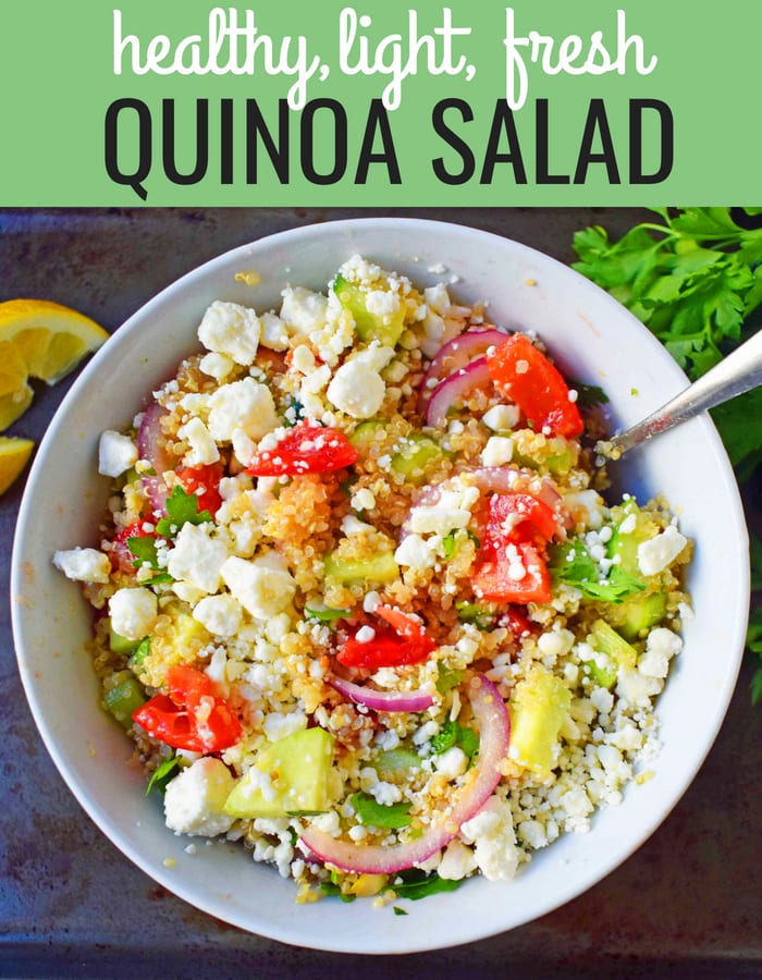 Mediterranean Quinoa Salad with feta cheese, tomatoes, cucumber, and red onions, all tossed in a red wine vinaigrette. www.modernhoney.com