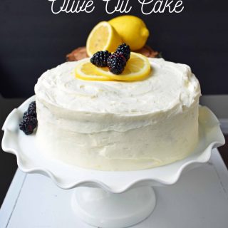 Italian Lemon Olive Oil Cake. Soft and tender moist lemon cake topped with lemon vanilla cream cheese frosting. The perfect lemon cake! www.modernhoney.com