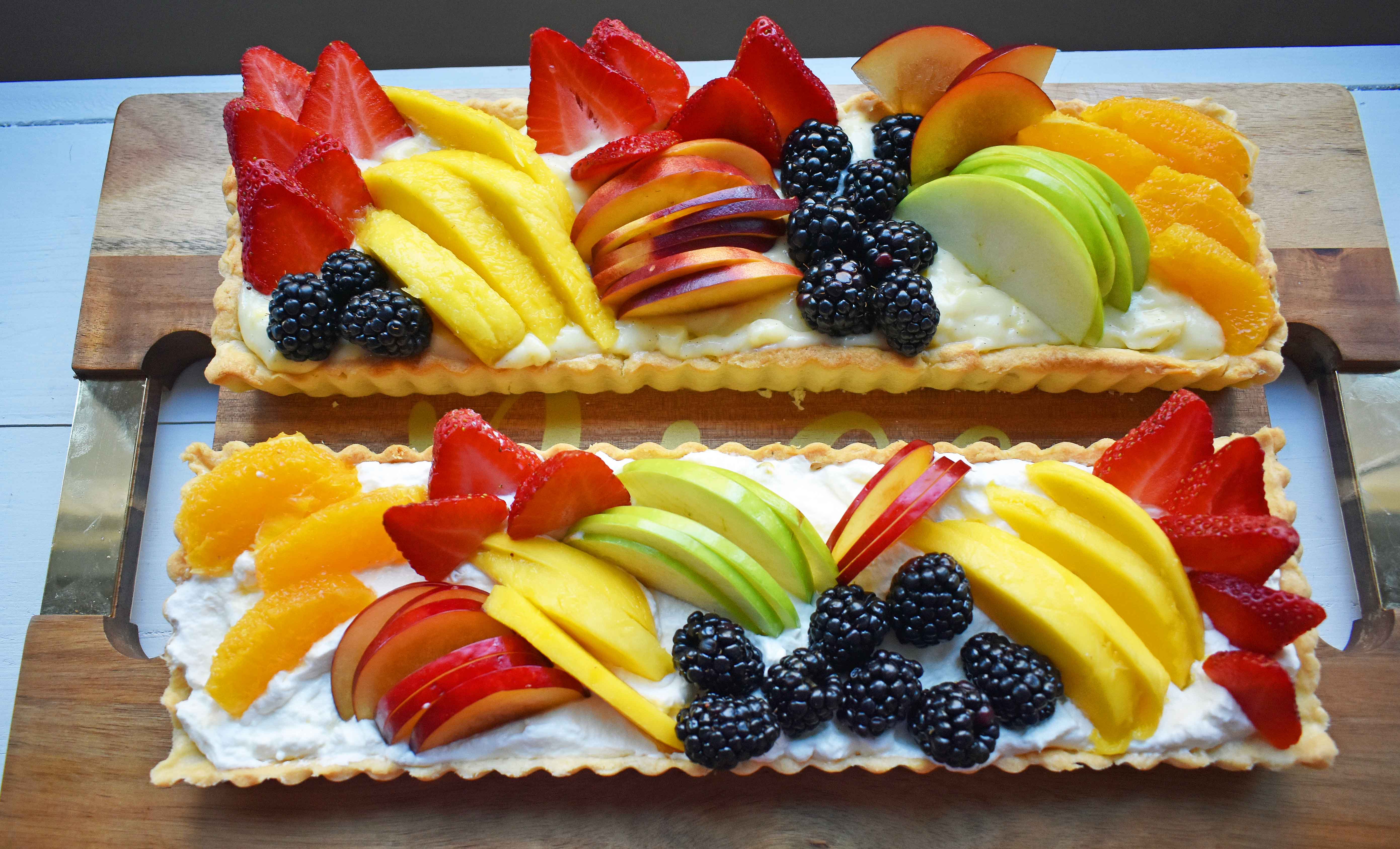 Lemon Cream Filled Fruit Tart. Buttery, flaky pie crust baked in tart pan and filled with homemade lemon cream and topped with sliced fresh fruit. A beautiful Spring and Summer dessert that everyone loves. www.modernhoney.com