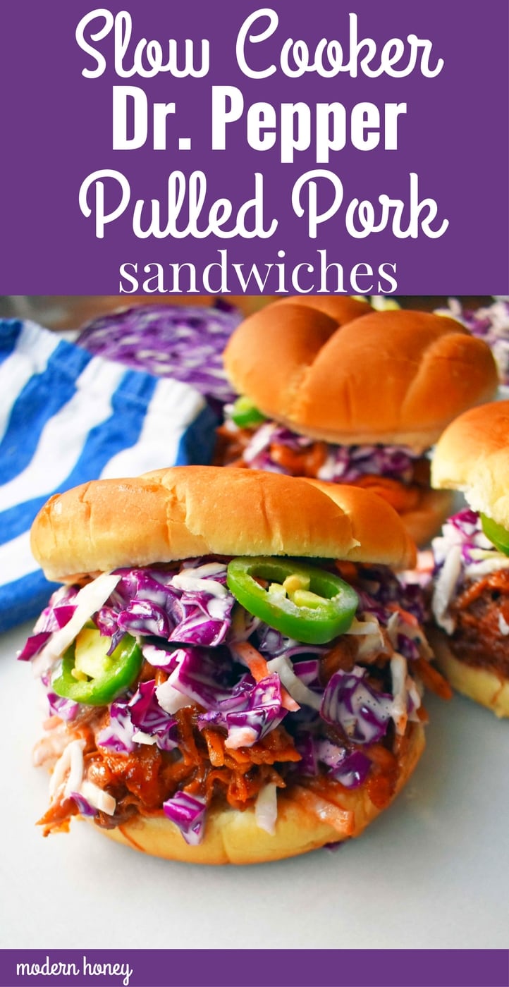 Slow Cooker Dr. Pepper Pulled Pork Sandwich. Slow cooked pork simmered with Dr. Pepper, spices, and BBQ sauce. Topped with homemade coleslaw and fresh jalapenos, all on a soft bun. The perfect BBQ Pulled Pork Sandwich. www.modernhoney.com