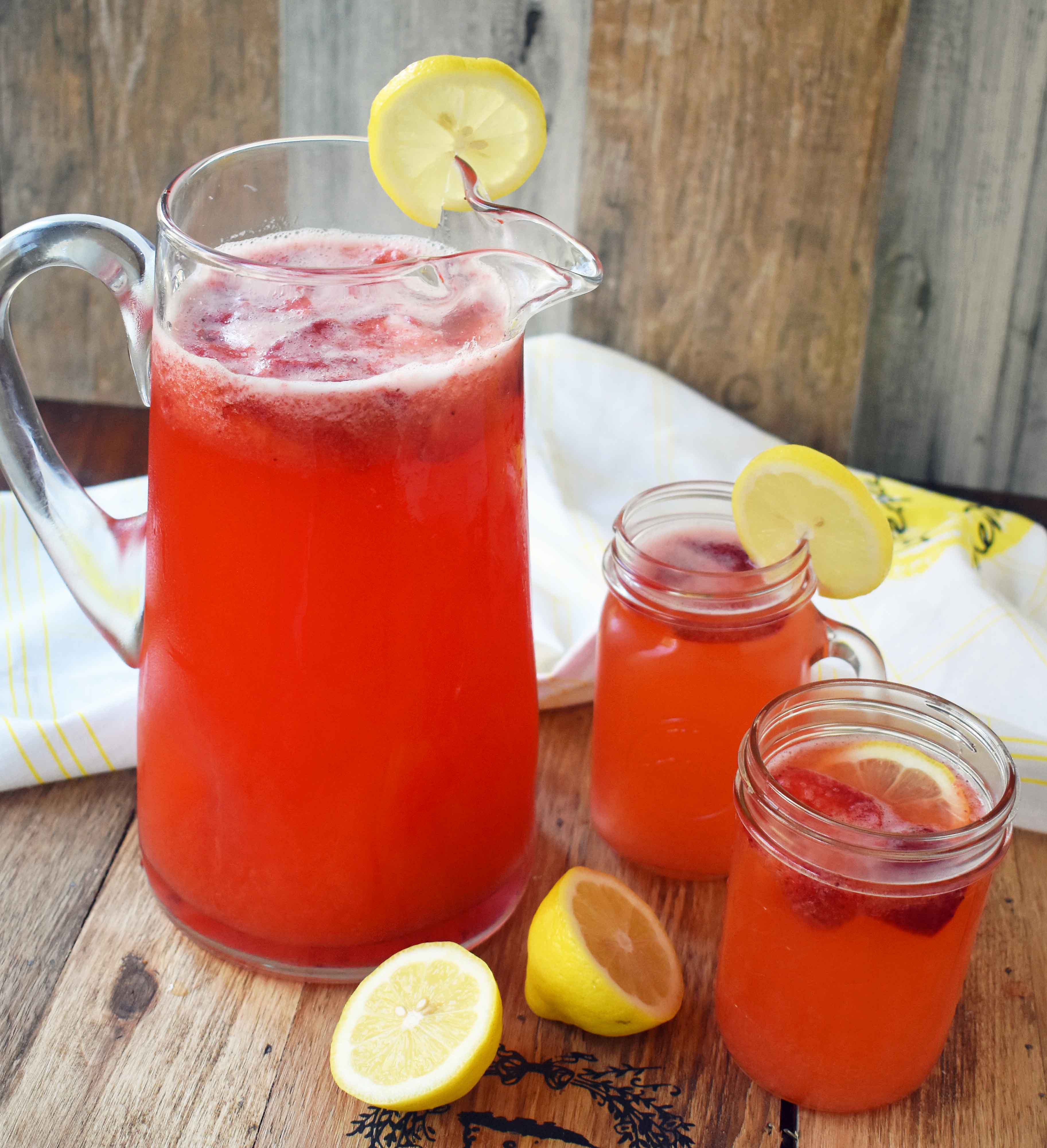 Fresh Strawberry Lemonade made with freshly squeezed lemon juice, fresh strawberries, sweet sugar, water, and ice. A super simple drink that is perfect for summer! www.modernhoney.com