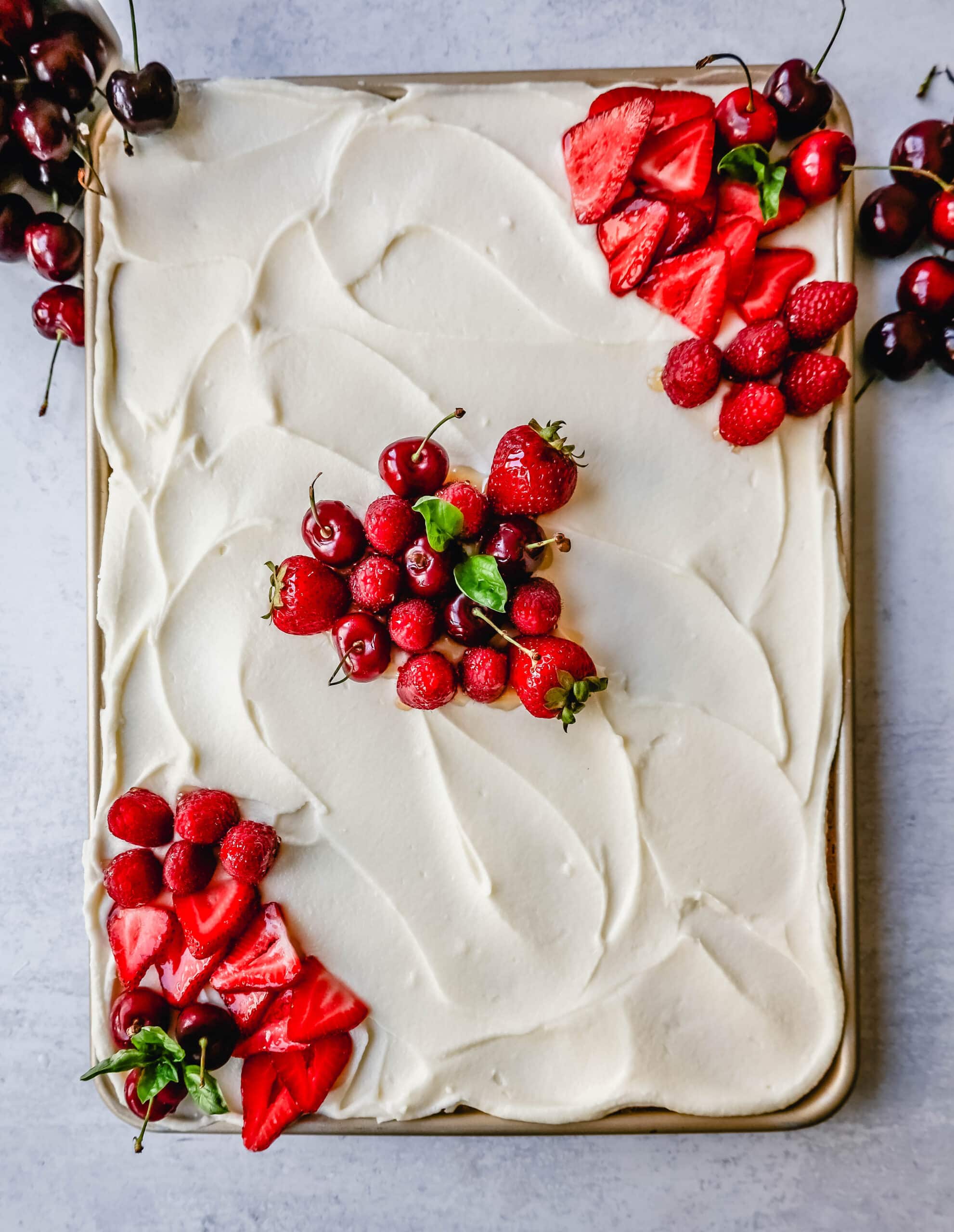 White Texas Sheet Cake Recipe with a moist vanilla sheet cake topped with a creamy vanilla buttercream frosting. An easy white Texas sheet cake that tastes delicious!