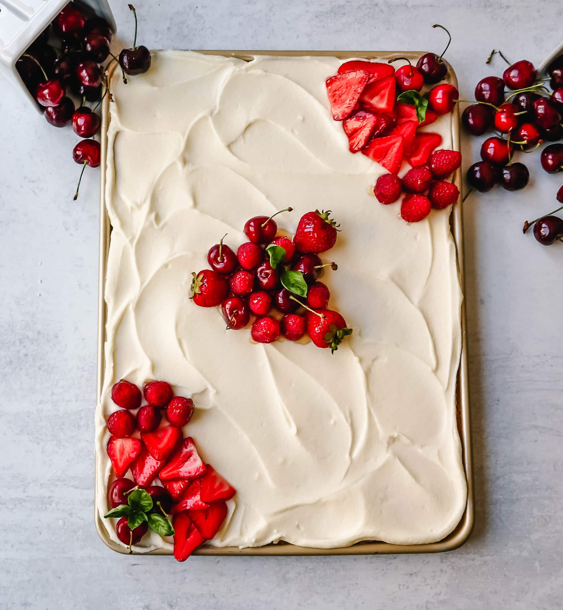 White Texas Sheet Cake Recipe with a moist vanilla sheet cake topped with a creamy vanilla buttercream frosting. An easy white Texas sheet cake that tastes delicious!