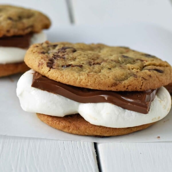 Chocolate Chip Cookie S'mores. Warm, homemade chocolate chip cookies sandwiched with melted toasted marshmallow and rich milk chocolate. The ultimate s'mores. www.modernhoney.com