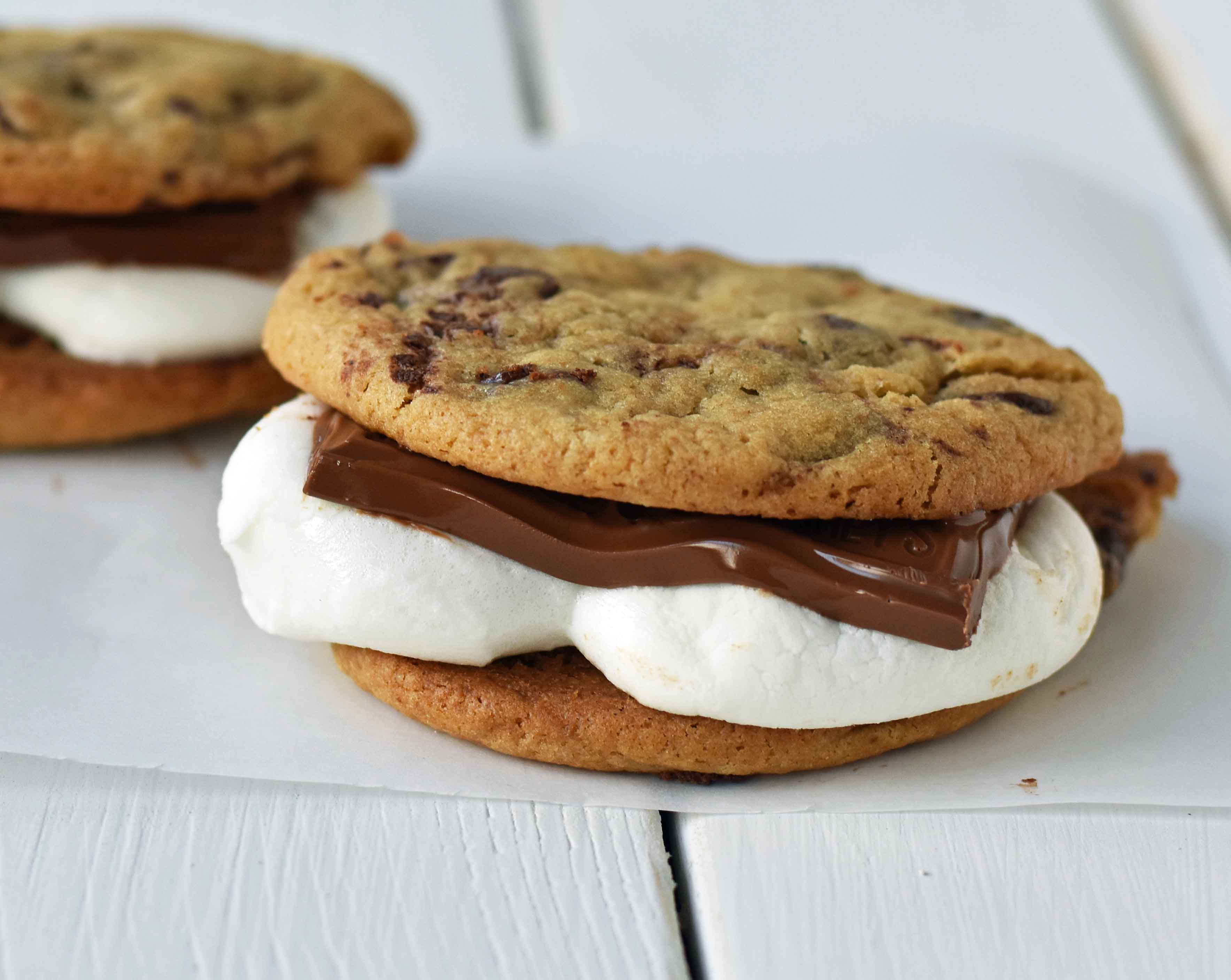 Chocolate Chip Cookie S'mores. Warm, homemade chocolate chip cookies sandwiched with melted toasted marshmallow and rich milk chocolate. The ultimate s'mores. www.modernhoney.com