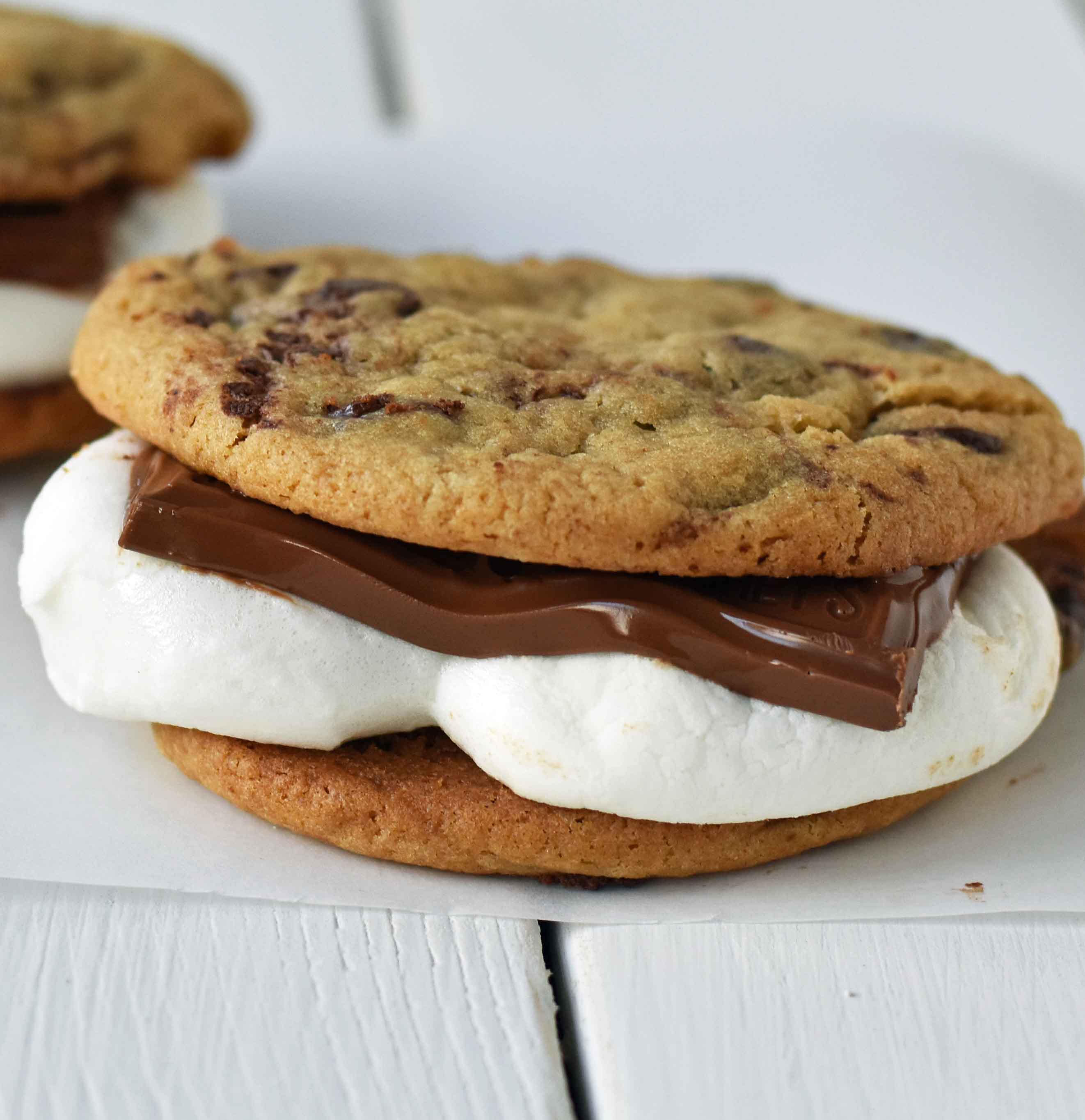 Chocolate Chip Cookie S'mores. Warm, homemade chocolate chip cookies sandwiched with melted toasted marshmallow and rich milk chocolate. The ultimate s'mores. www.modernhoney.com