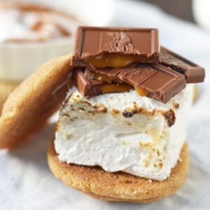 Chocolate Sea Salt Caramel S'mores. Brown Butter Cinnamon Sugar Snickerdoodles layered with homemade marshmallows, sea salt chocolate caramel ghirardelli squares. www.modernhoney.com