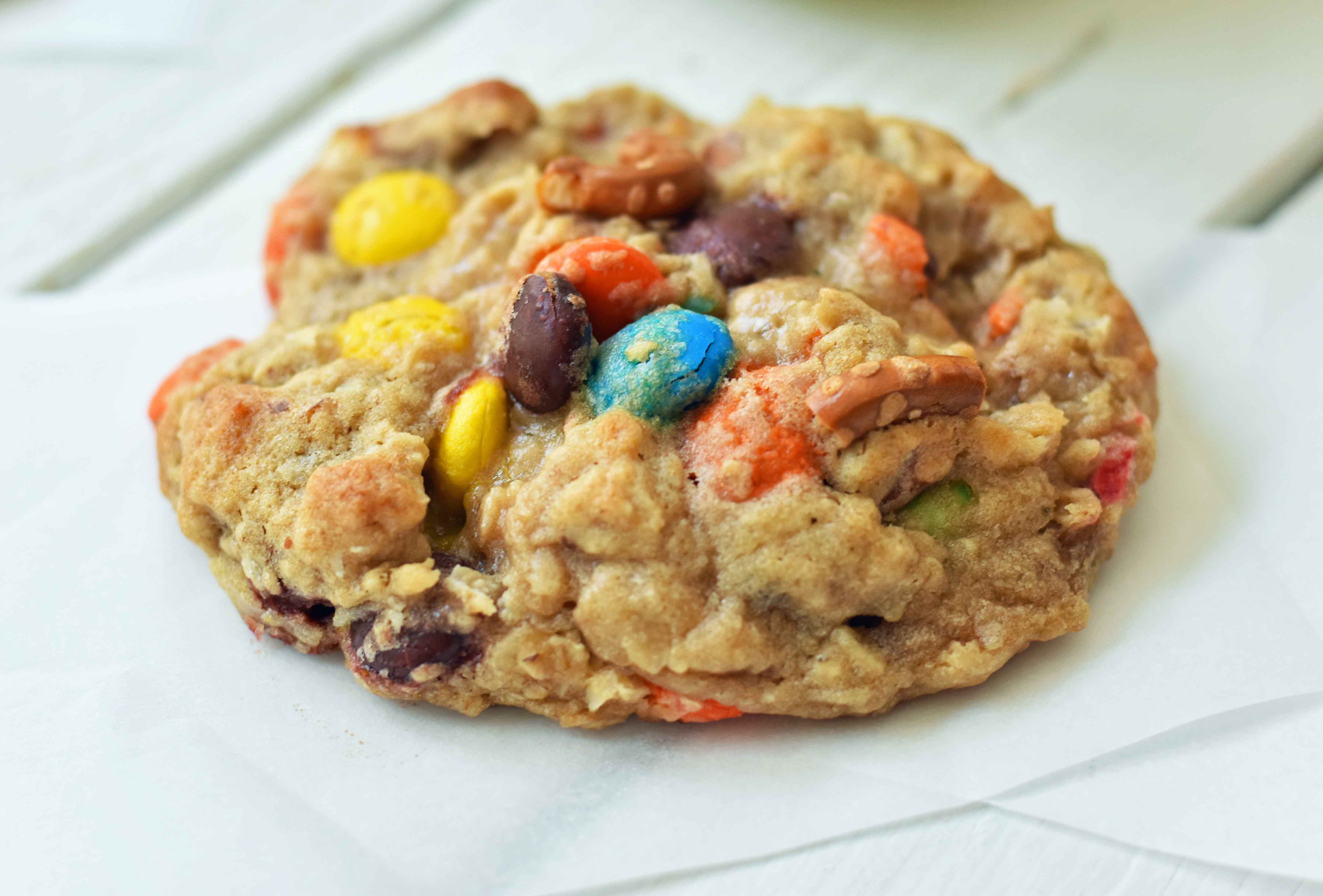 The Overachiever Oatmeal Pretzel M & M Cookie made with a sweet oatmeal cookie dough with oatmeal, shredded coconut, pretzels and M & M's. This Overachiever Cookie is the perfect balance of sweet and salty. www.modernhoney.com