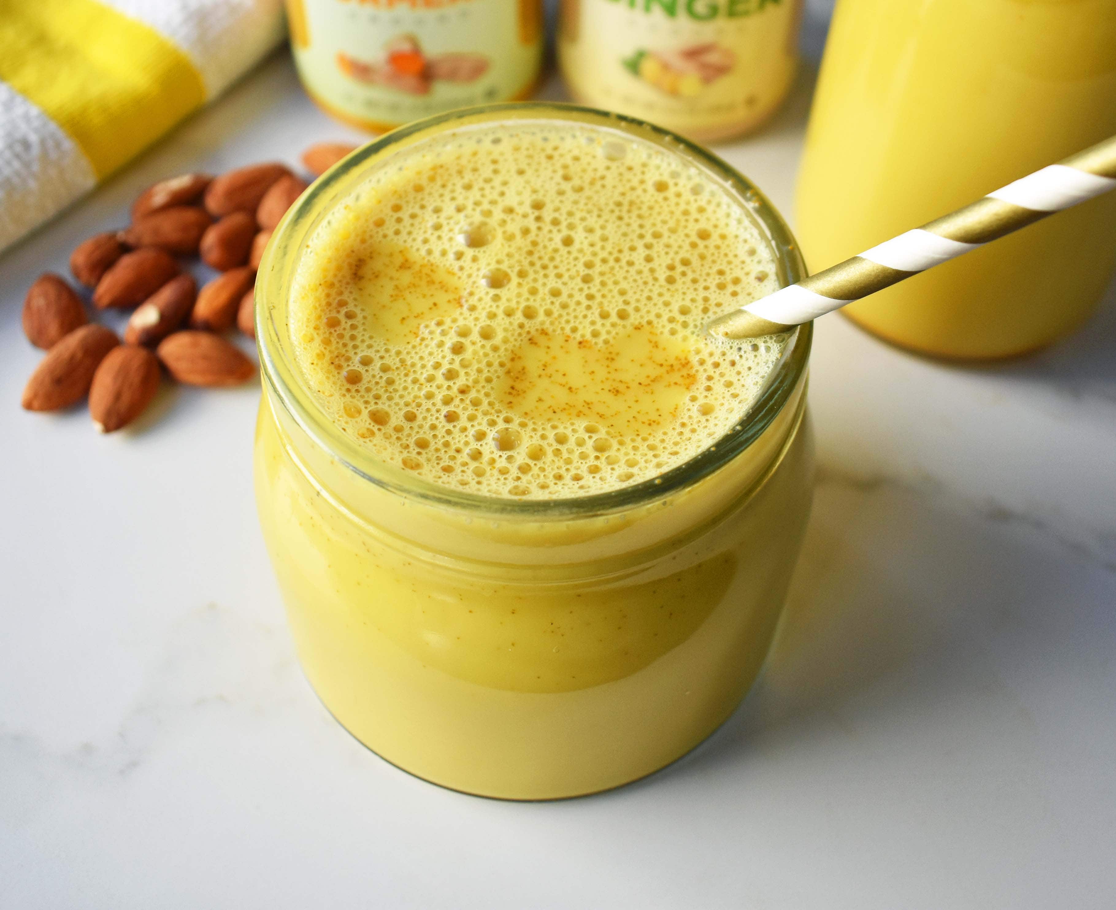 Ancient Golden Milk or Turmeric Tea Recipe. A healing tea full of anti-inflammatory and antioxidant benefits. Simmered with almond milk, turmeric, ginger, cinnamon and a touch of maple syrup. Warm and comforting turmeric tea. www.modernhoney.com