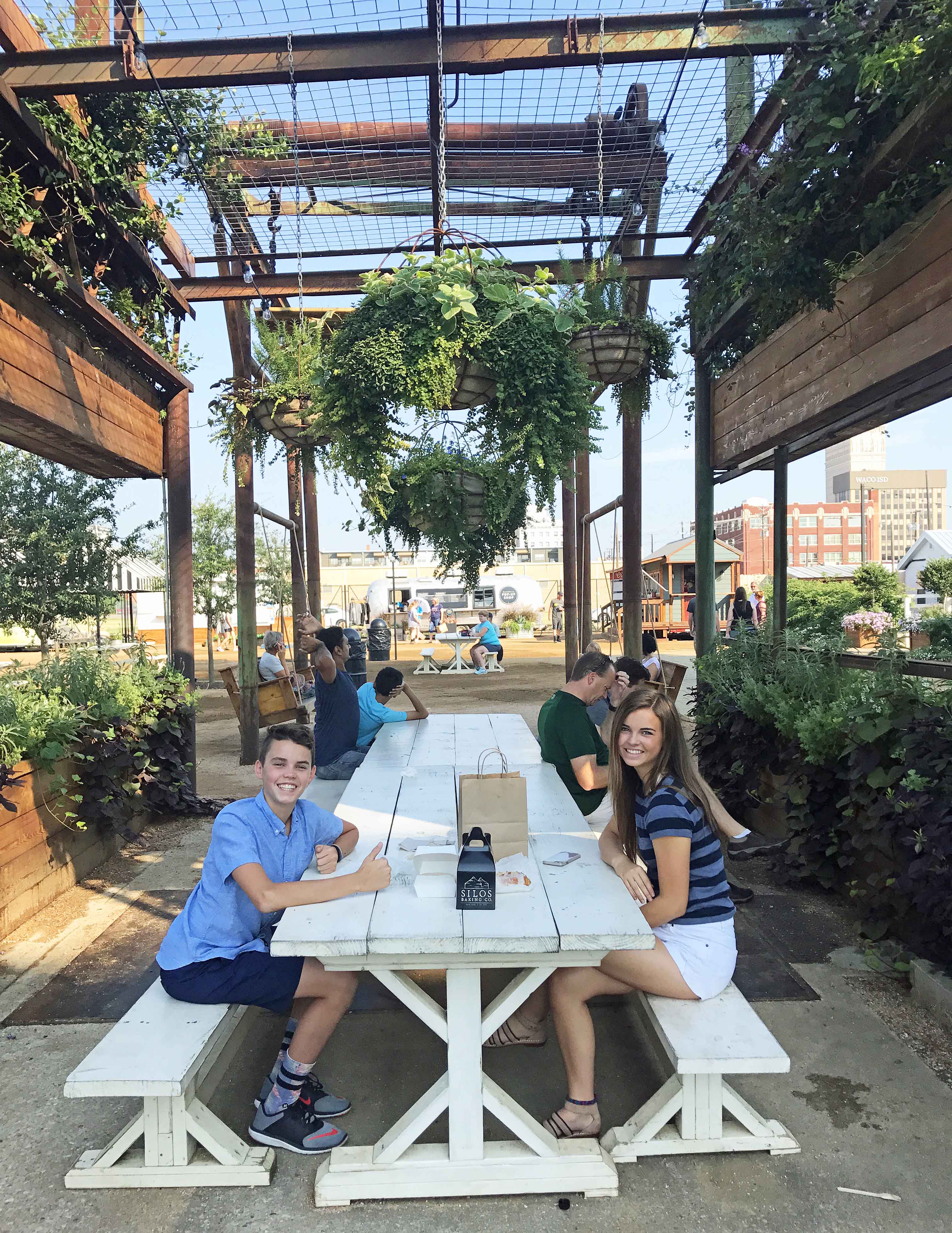 How to plan the perfect trip to Magnolia Market at the Silos in Waco Texas. Magnolia Market was created by HGTV's Fixer Upper favorite couple, Chip and Joanna Gaines. Visit Magnolia Market, Silo Baking Co. and the beautiful grounds. Tips for planning a trip to Magnolia Market. www.modernhoney.com