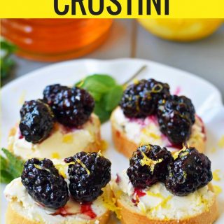 Blackberry and Lemon Mascarpone Crostini is made with a toasted french baguette, creamy mascarpone cheese, sugar marinated blackberries, lemon zest, and a drizzle of honey. A perfect appetizer for a bridal shower, baby shower, party, festive holiday gathering, or at home. A sophisticated and beautiful quick and easy appetizer. www.modernhoney.com