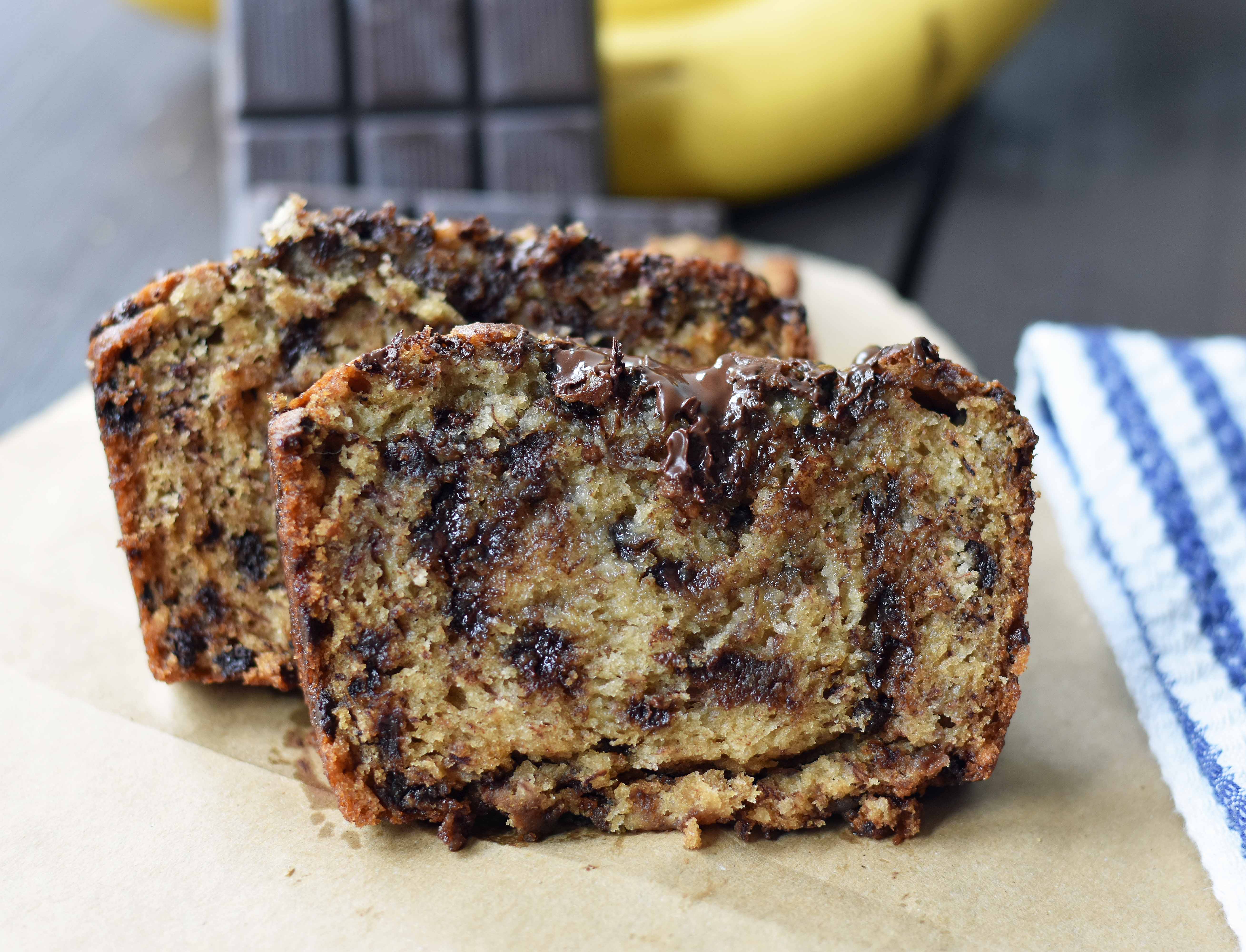 The best ever chocolate chip banana bread. Moist and delicious banana bread with chocolate chips. Banana bread made with butter, oil, and sour cream to create a perfect banana bread. www.modernhoney.com