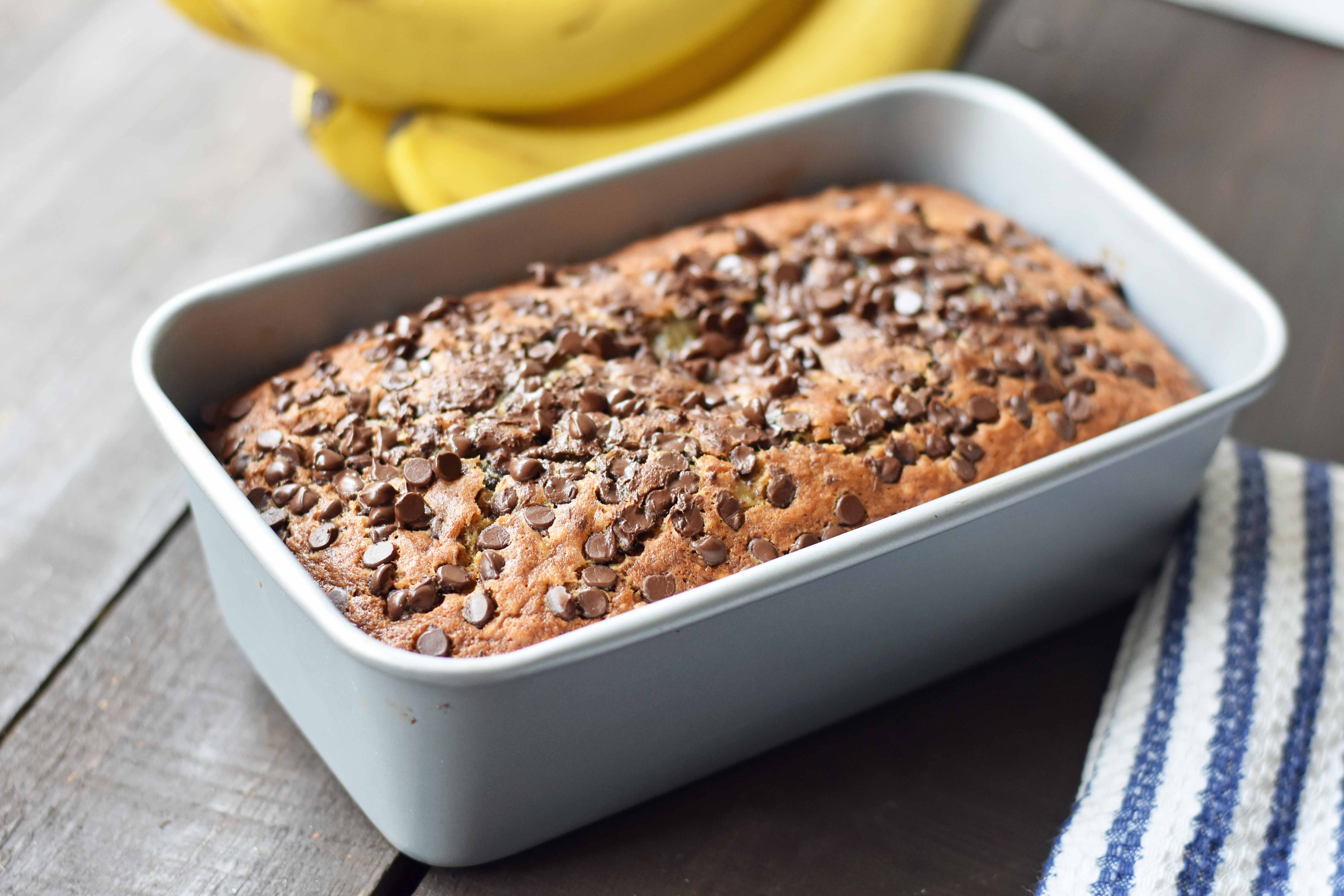 The best ever chocolate chip banana bread. Moist and delicious banana bread with chocolate chips. Banana bread made with butter, oil, and sour cream to create a perfect banana bread. www.modernhoney.com