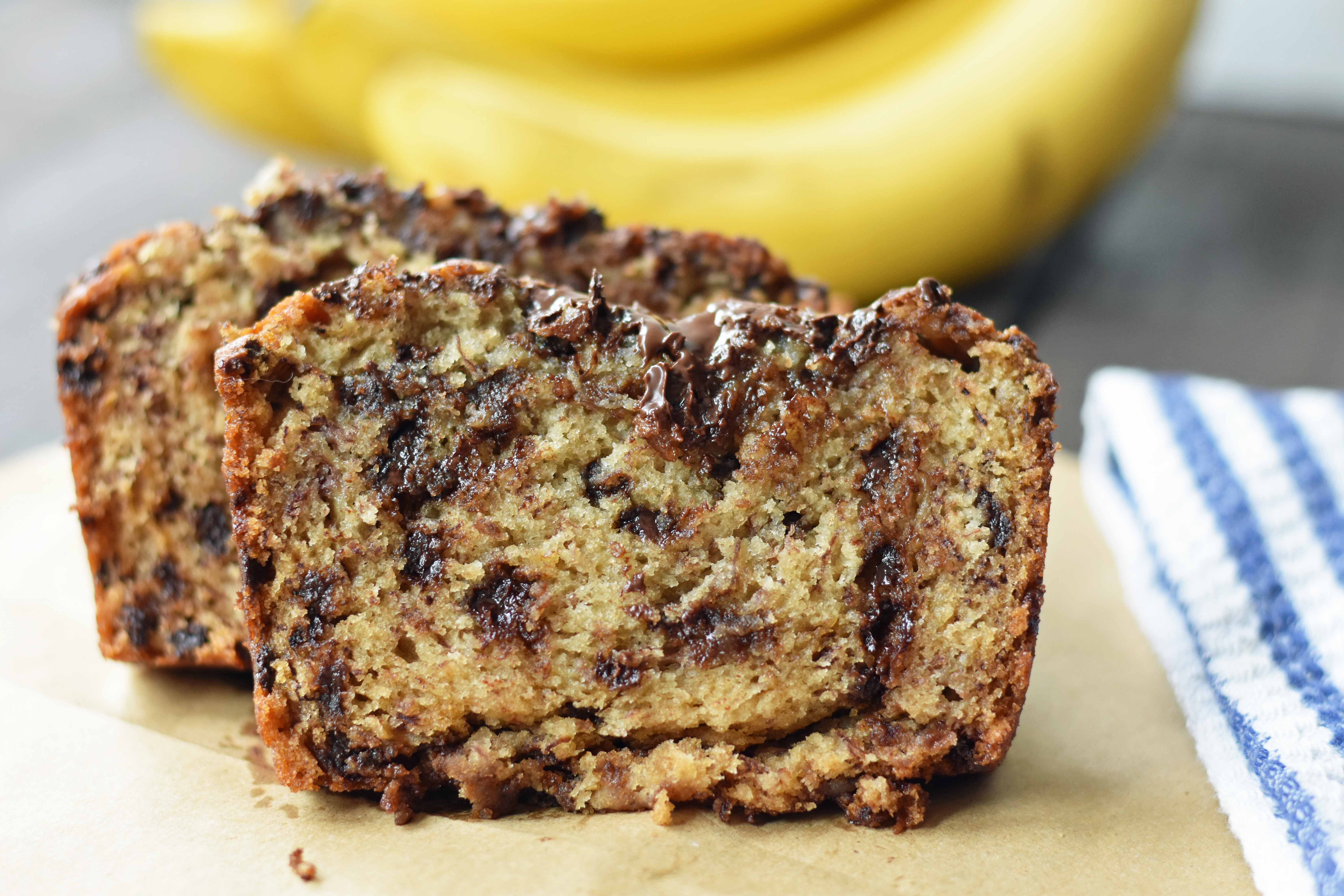 The best ever chocolate chip banana bread. Moist and delicious banana bread with chocolate chips. Banana bread made with butter, oil, and sour cream to create a perfect banana bread. www.modernhoney.com