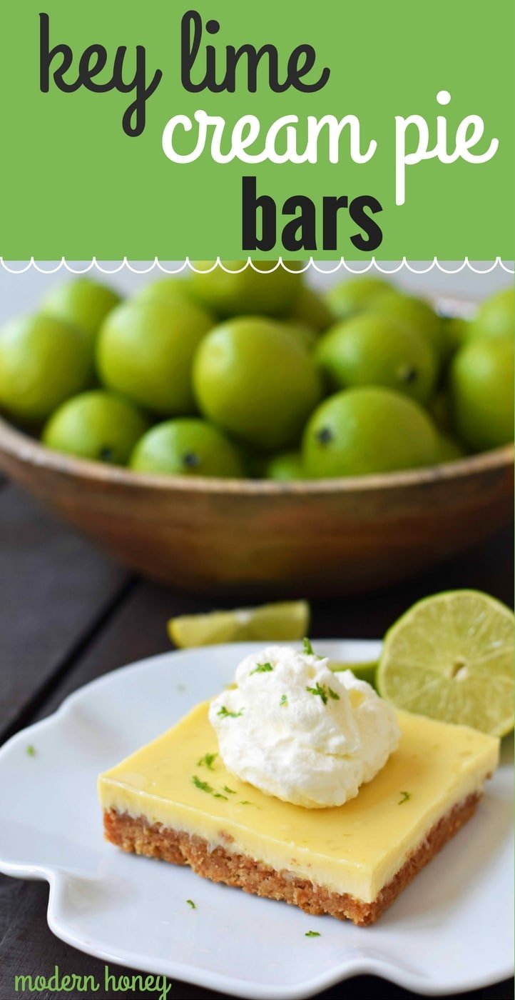 Key Lime Cream Pie Bars made with a buttery graham cracker crust and sweet, tart, and creamy key lime filling and topped with homemade whipped cream. A beautiful and delicious dessert bar recipe. www.modernhoney.com