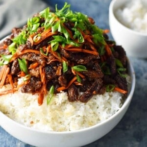 Mongolian Beef recipe. A P.F. Chang's Monglian Beef copycat recipe. Crispy beef in a sweet, salty, spicy sauce on a bed of rice. A popular asian dish. www.modernhoney.com