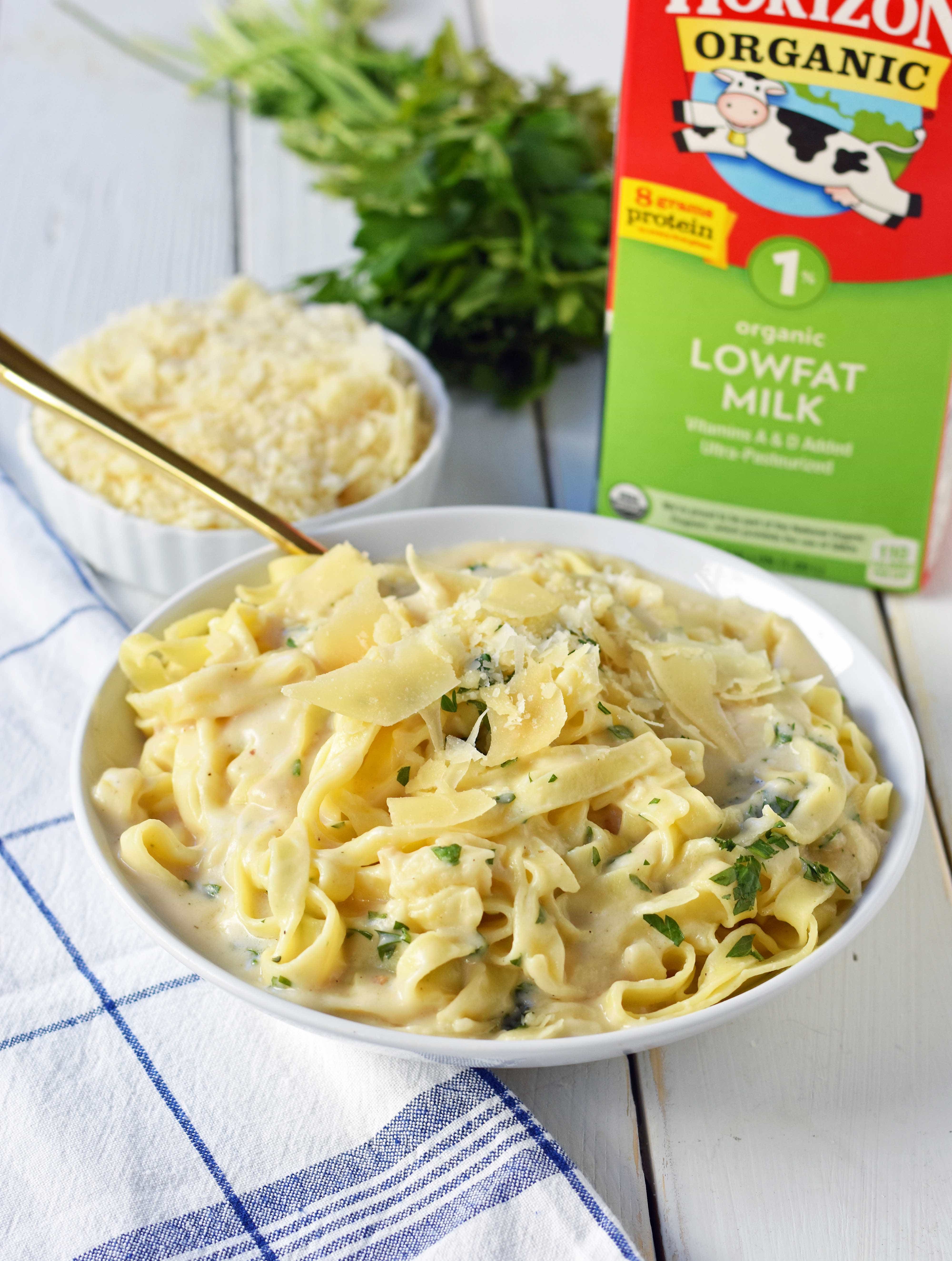 Skinny Fettuccine Alfredo is a low-fat version of America's favorite pasta dish. Rich and creamy fettuccine alfredo without all of the fat. This skinny fettuccine alfredo sauce is made with milk instead of heavy cream and has all of the flavor as the original. A 30-minute healthy meal that kids love. www.modernhoney.com