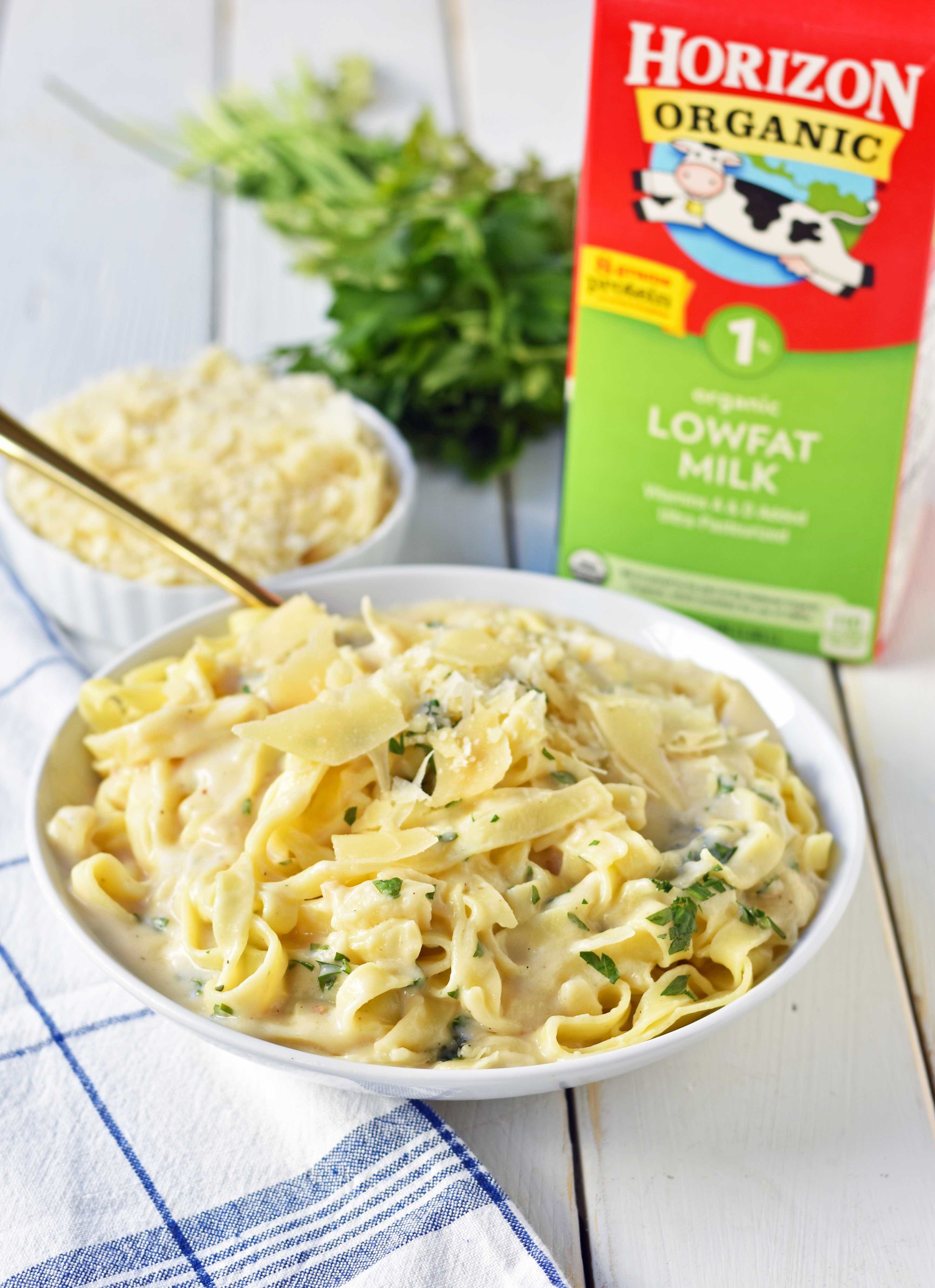 Skinny Fettuccine Alfredo is a low-fat version of America's favorite pasta dish. Rich and creamy fettuccine alfredo without all of the fat. This skinny fettuccine alfredo sauce is made with milk instead of heavy cream and has all of the flavor as the original. A 30-minute healthy meal that kids love. www.modernhoney.com