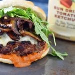 The Big Boss Burger made with seasoned ground beef, creamy pepper jack cheese, sauteed butter mushrooms and onions with a sriracha sun dried tomato aioli. A burger with a little kick! www.modernhoney.com