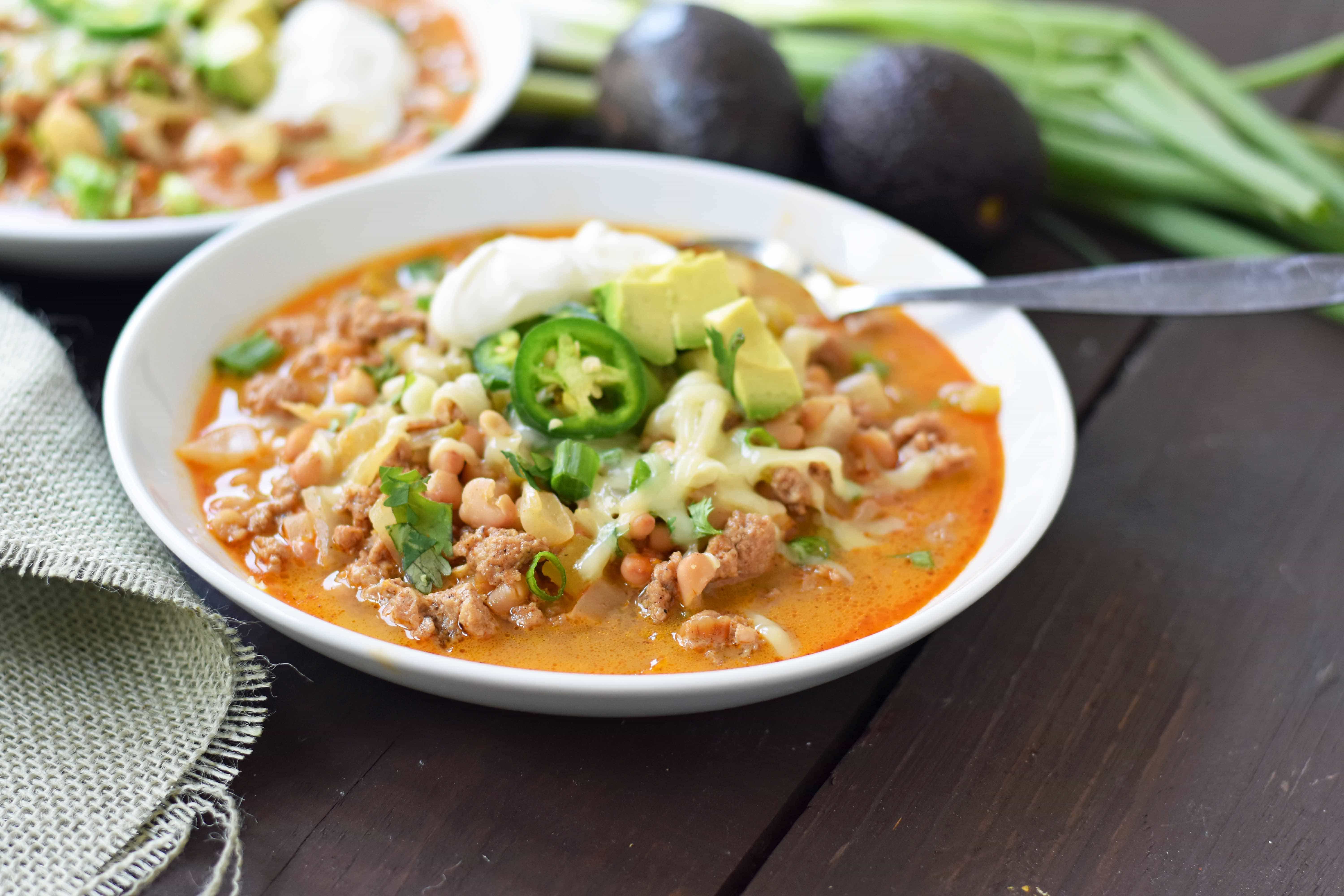 White Bean Turkey Chili is a healthy, nutritious soup made with lean protein, vegetables, and broth. Flavorful and delicious chili made in less than 30 minutes. www.modernhoney.com