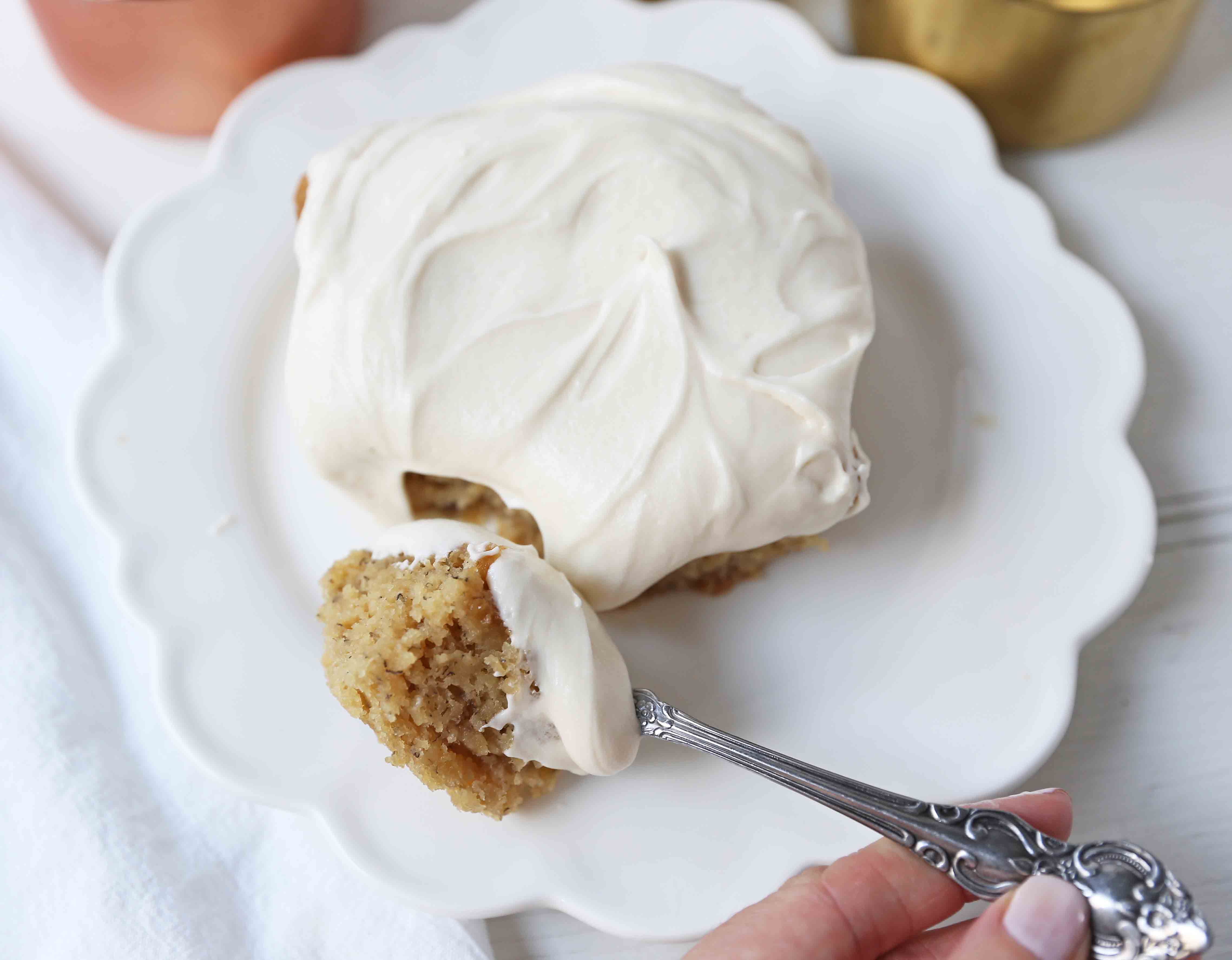 Banana Cake with Cream Cheese Frosting. Banana Sheet Cake with Frosting. www.modernhoney.com #bananacake #bananacakerecipe #bananacakecreamcheesefrosting #bananasheetcake 