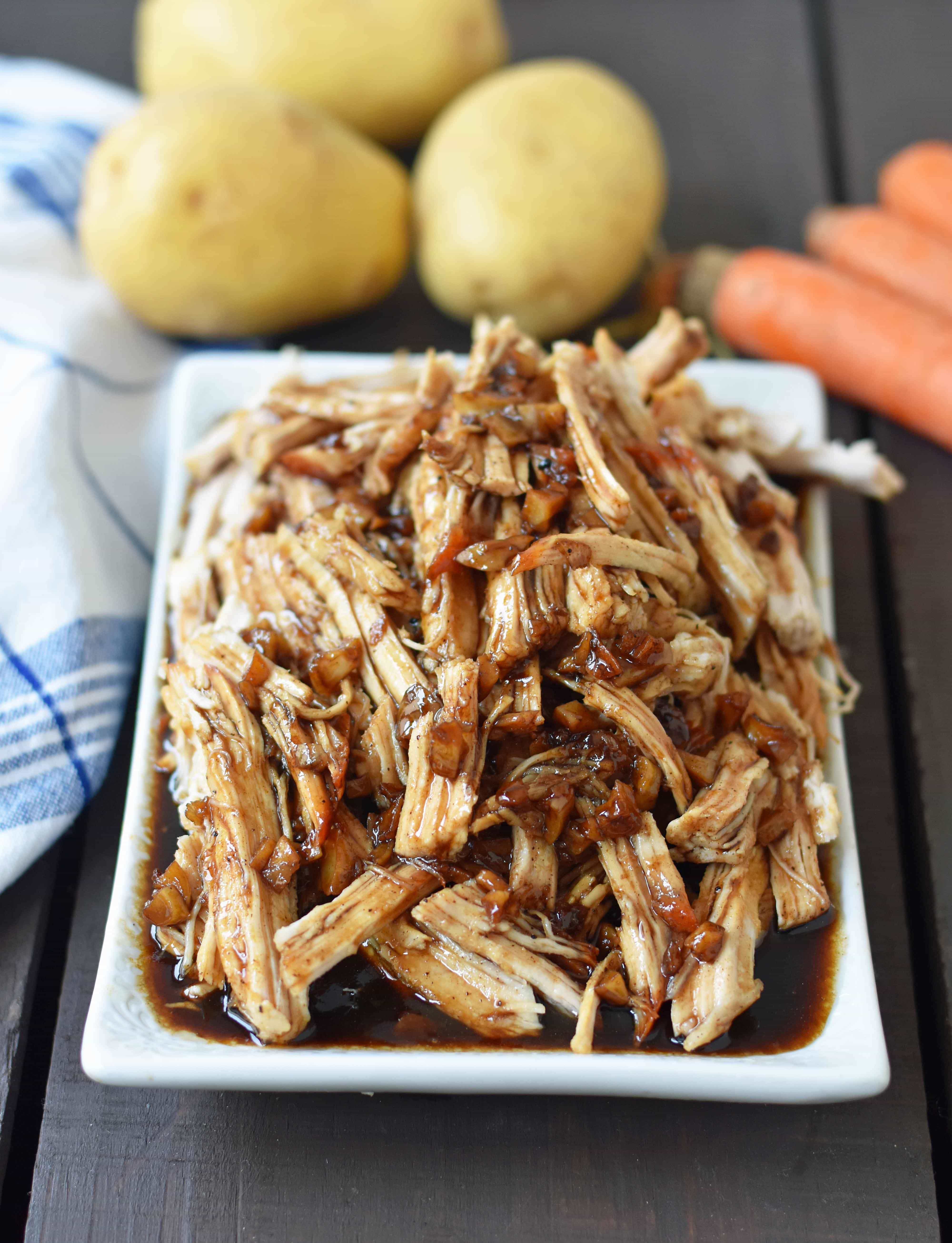 Brown Sugar Balsamic Pork. Tender lean pork loin slow cooked in a brown sugar garlic balsamic glaze. An easy flavorful meal made in a slow cooker or instant pot. www.modernhoney.com