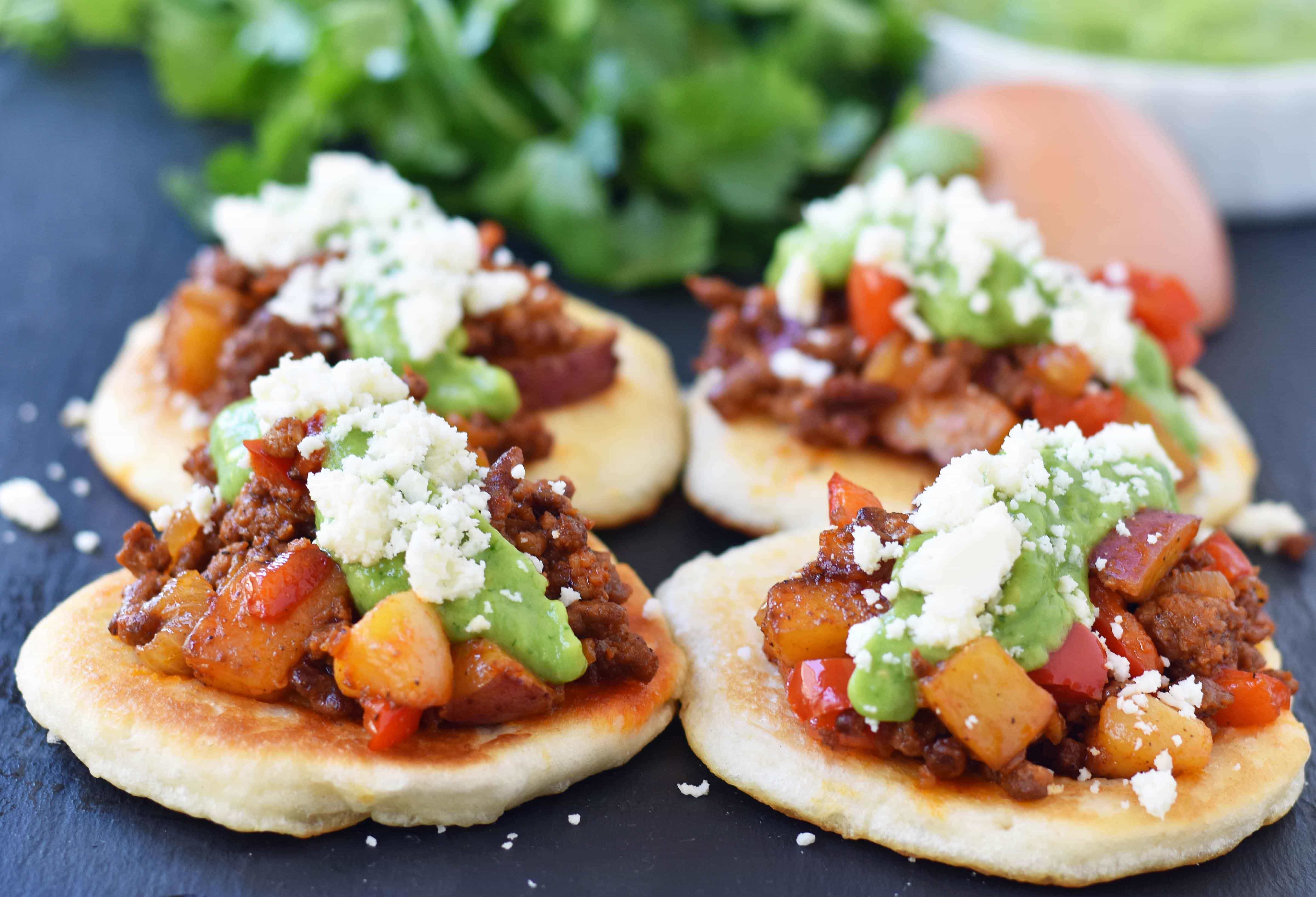 Chorizo Potato Puffy Tacos from Melissa Stadler 46th Pillsbury Bake-Off Contest. Puffy Tacos made with Pillsbury biscuit dough and filled with spicy chorizo, seasoned potatoes and peppers, a creamy avocado tomatillo crema, and cotija cheese. www.modernhoney.com