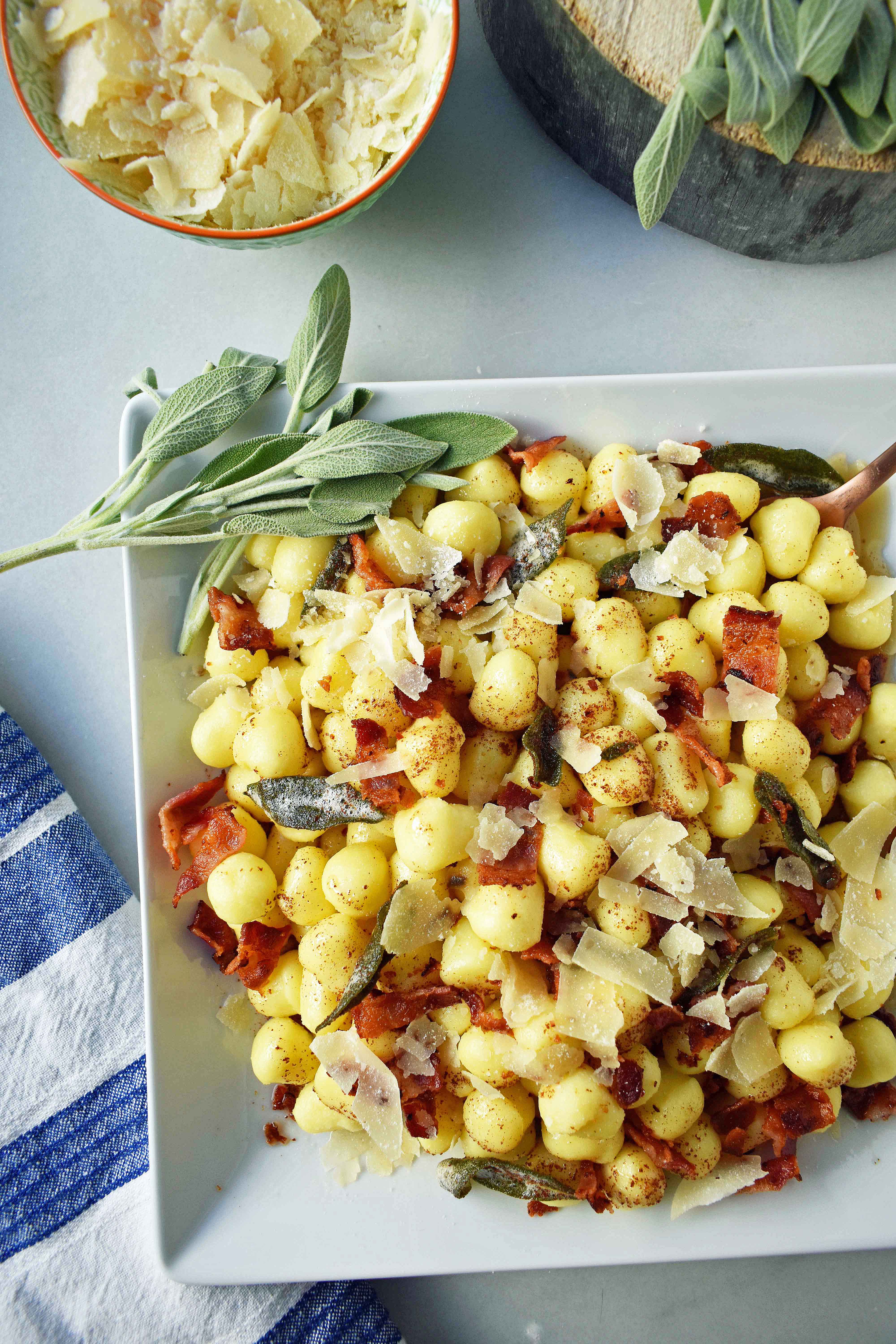 Pan Seared Brown Butter Gnocchi with Crispy Pancetta and Sage is a simple Italian pasta dish made with soft potato gnocchi sauteed in brown butter, crispy pancetta, and sage. It is an easy weeknight dinner for the family. www.modernhoney.com